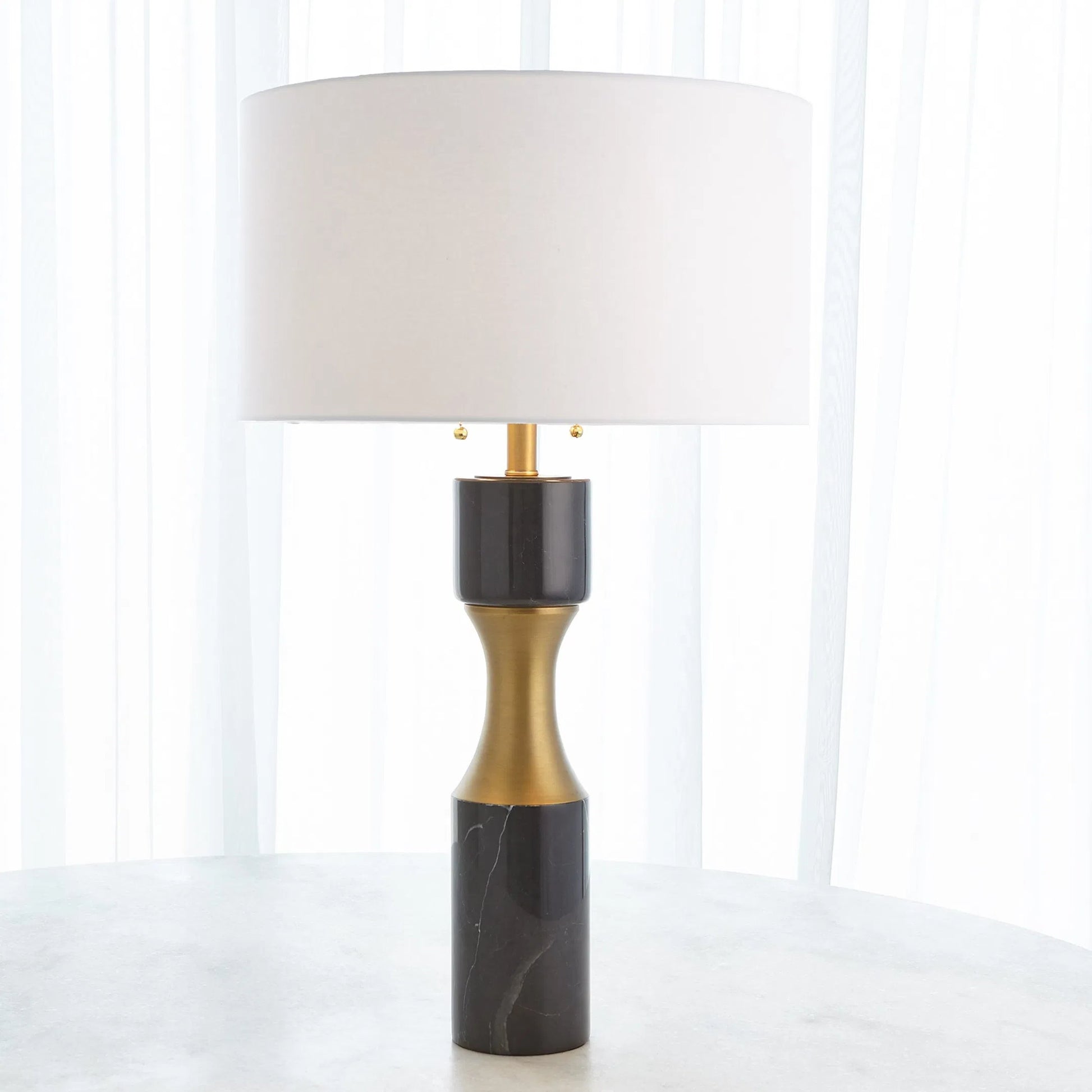 Marble Cinch Lamp by Global Views. Made from marble, brass in a transitional style.
