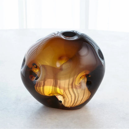 Dimpled Sphere by Global Views. Made from art glass in a eclectic & global style.