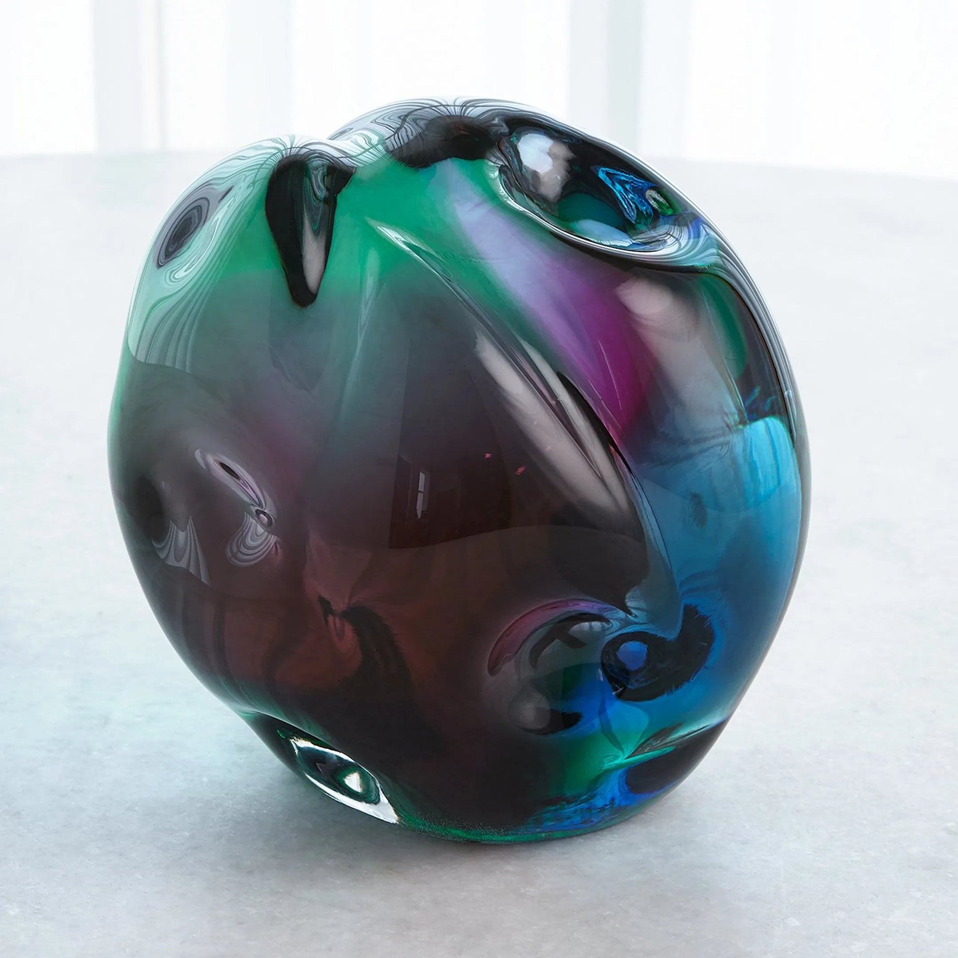 Dimpled Sphere by Global Views. Made from art glass in a eclectic & global style.