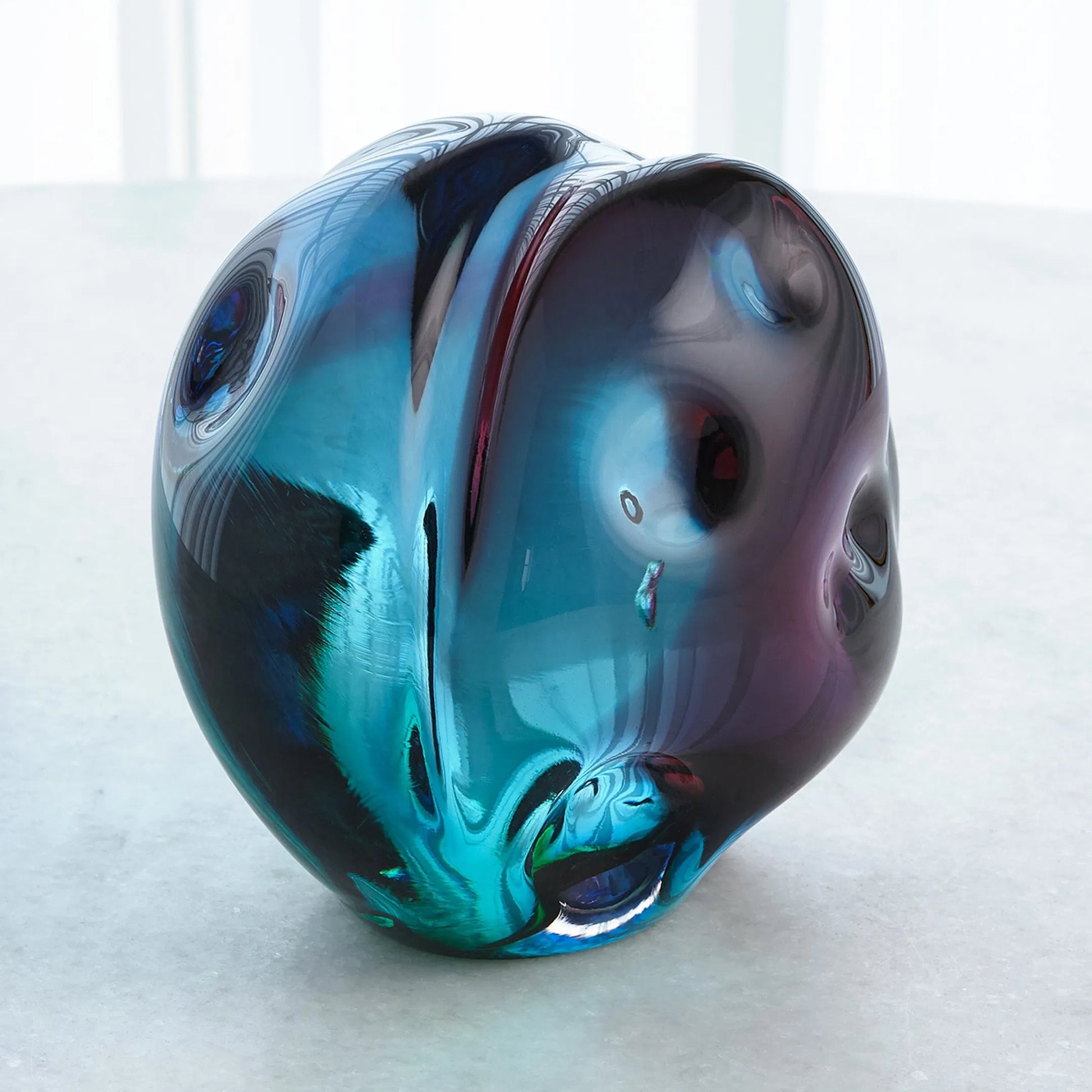 Dimpled Sphere by Global Views. Made from art glass in a eclectic & global style.