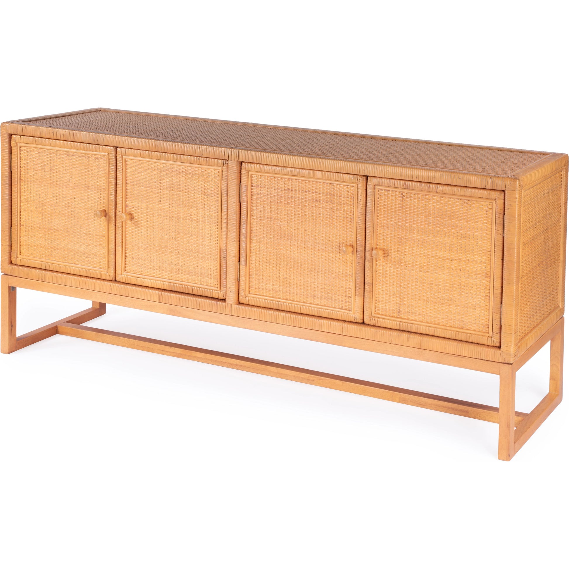 Captiva Rattan 4 Door Sideboard by Butler Specialty Company in natural and natural rattan. Made from rubber wood, rattan, plywood in a cottage & farmhouse style.