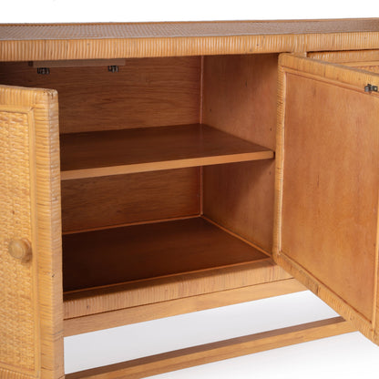 Captiva Rattan 4 Door Sideboard by Butler Specialty Company in natural and natural rattan. Made from rubber wood, rattan, plywood in a cottage & farmhouse style.