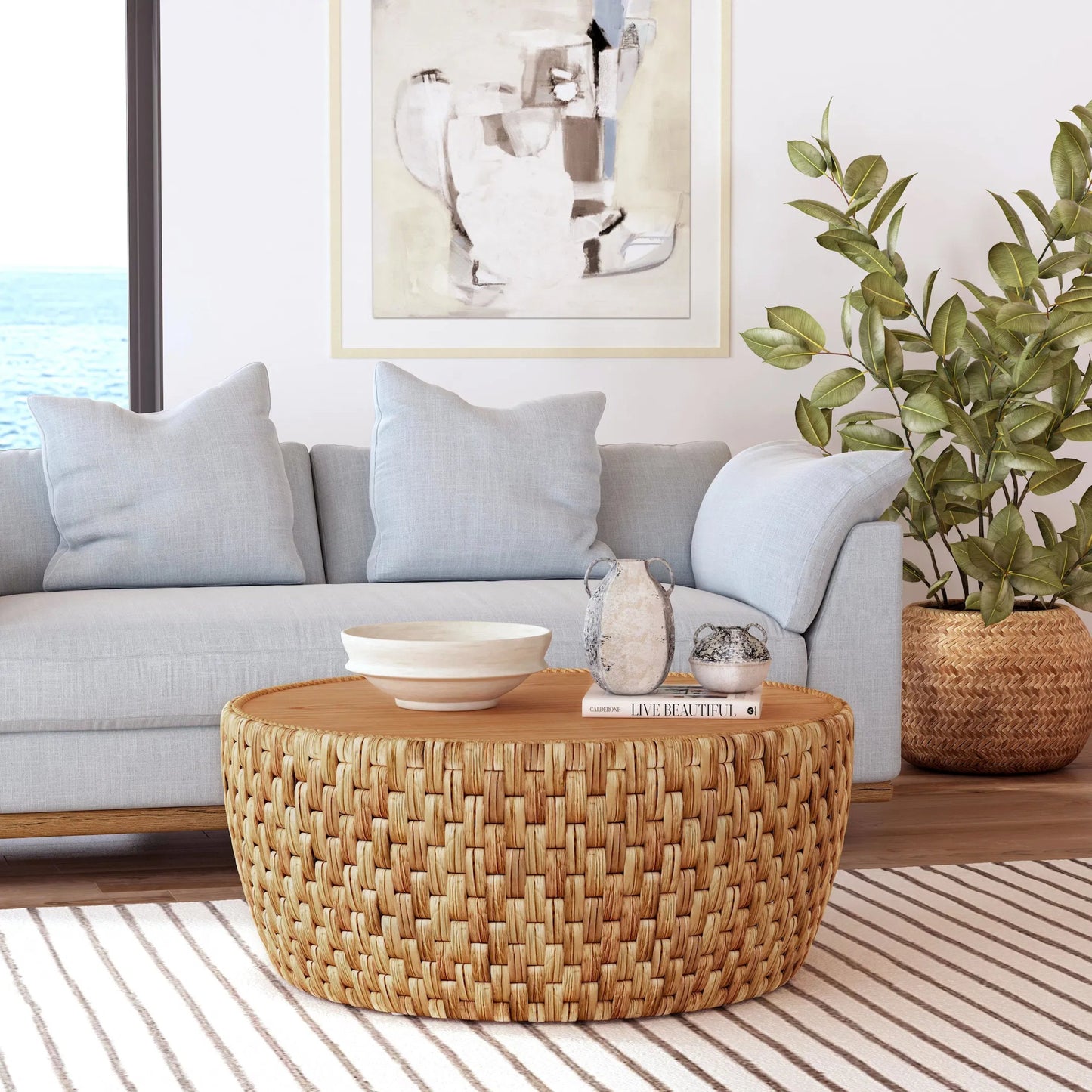 006 SI-2077779 | Lifestyle | Captiva Round Rattan Drum Coffee Table by Butler Specialty Company in natural and natural rattan. Made from mdf, mindi veneer, rattan in a cottage & farmhouse style.