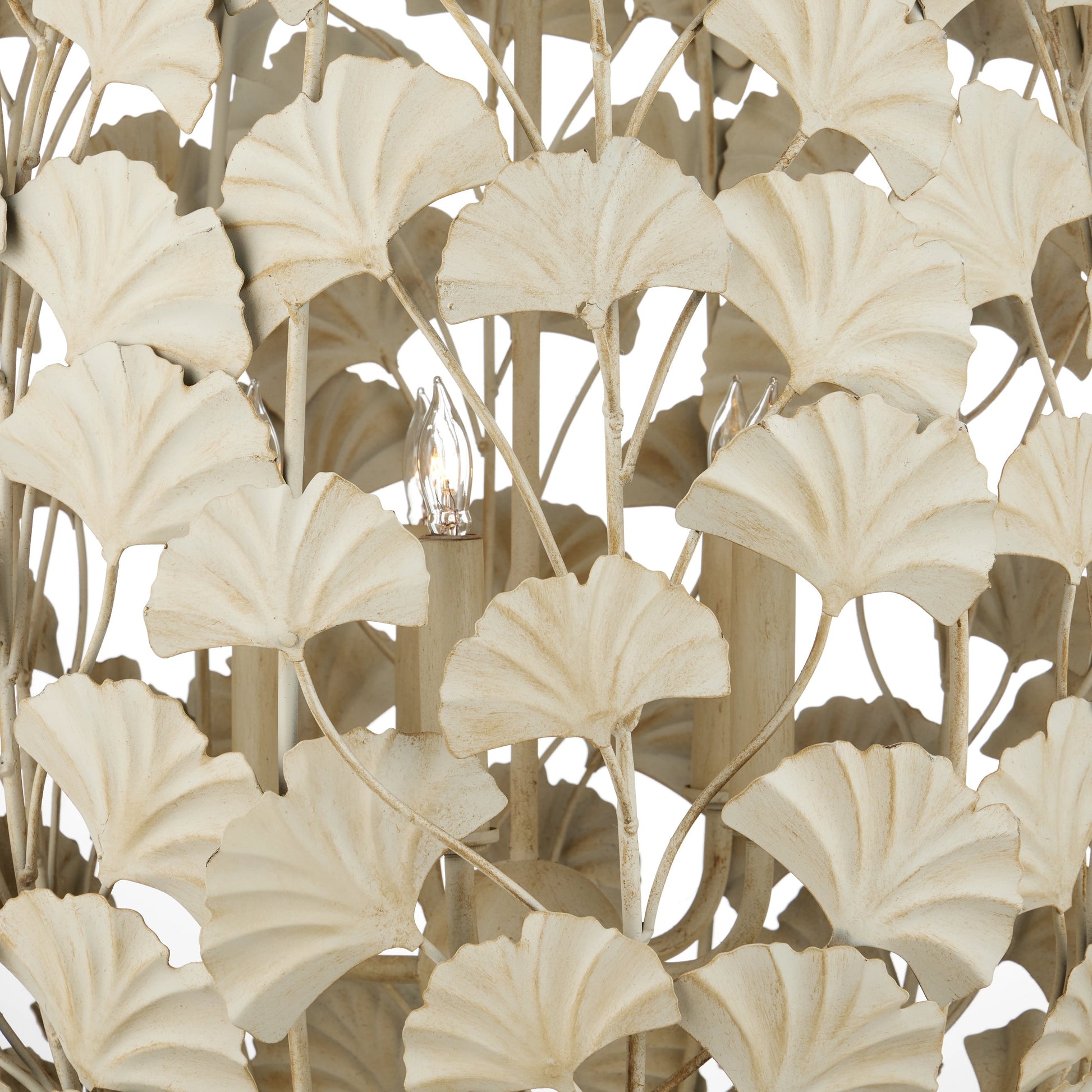 Maidenhair Cream Chandelier by Currey and Company in antique pearl. Made from wrought iron in a modern style.