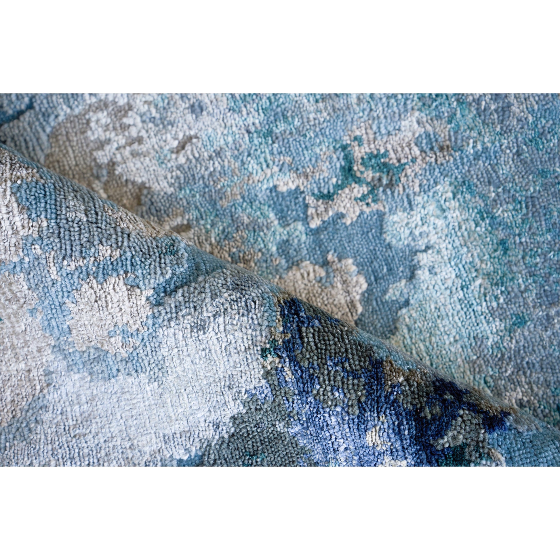 Cosmo 5706 Rug by Exquisite Rugs in blue, silver, dark gray. Made from unique in a unique style.