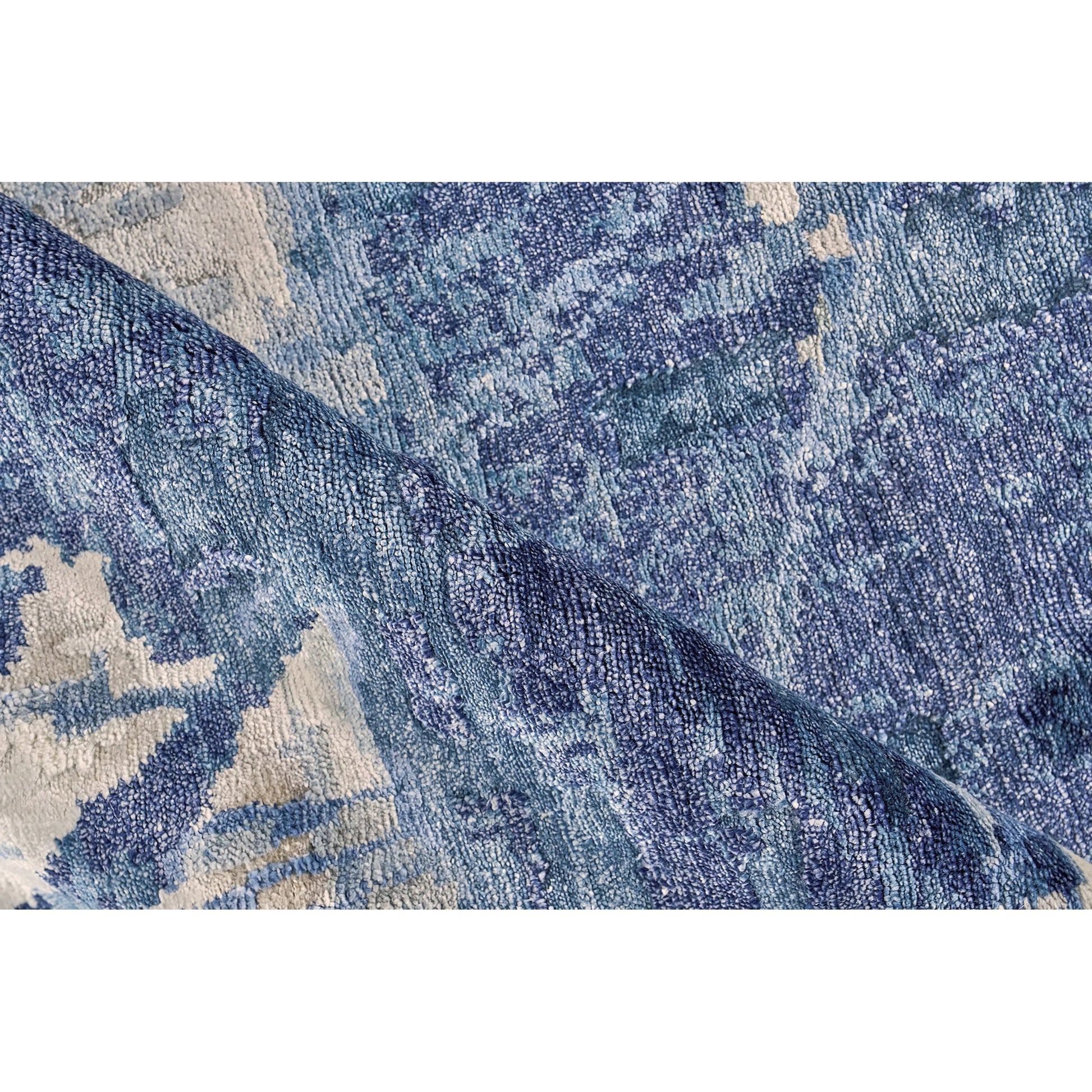Floor Art Rug by Exquisite Rugs. Made from bamboo silk in a unique style.