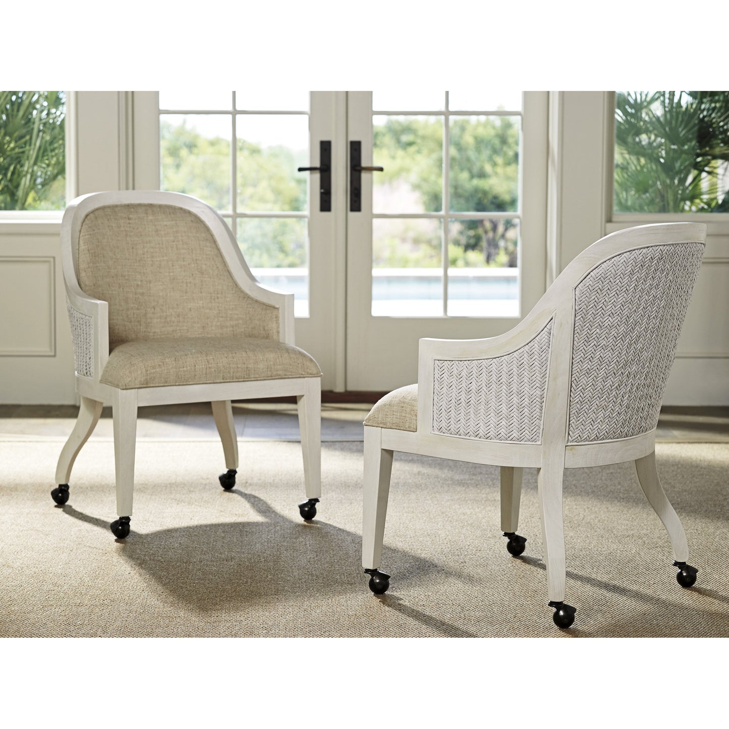 002 SR-835954 | Lifestyle | Bayview Arm Chair with Casters by Tommy Bahama Home in natural. Made from unique in a transitional style.