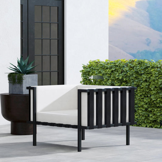 Norway Outdoor Club Chair with Cushion by Butler Specialty Company in black and white and black. Made from made from iron, foam, fabric, plyboard and nylon strip in a modern style.