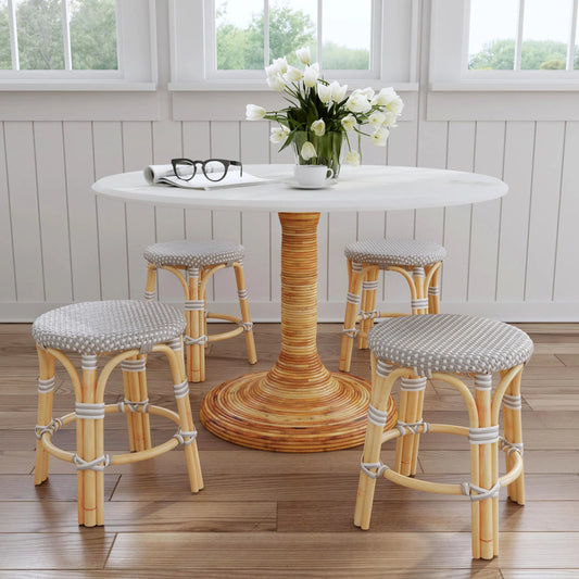 Tobias Rattan Round 18" Stool by Butler Specialty Company. Made from rattan, polyurethane synthetic rattan in a coastal style.