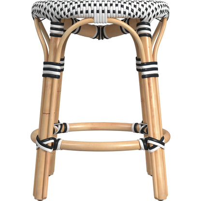 Tobias Rattan Round 18" Stool by Butler Specialty Company. Made from rattan: 60%, polyurethane synthetic rattan (pe): 40% in a coastal style.