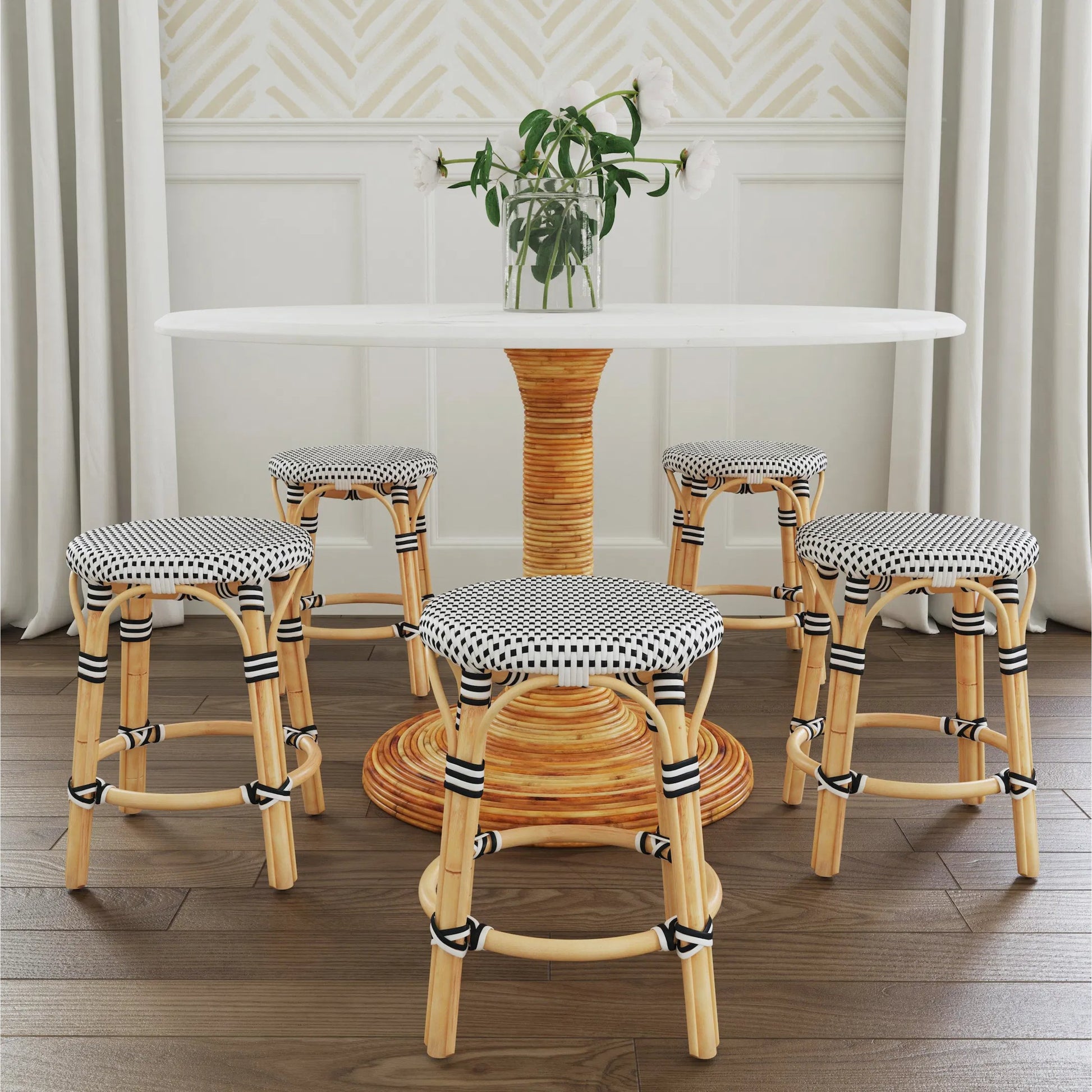 Tobias Rattan Round 18" Stool by Butler Specialty Company. Made from rattan: 60%, polyurethane synthetic rattan (pe): 40% in a coastal style.