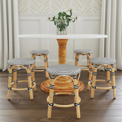 Tobias Rattan Round 18" Stool by Butler Specialty Company. Made from rattan: 60%, polyurethane synthetic rattan (pe): 40% in a coastal style.