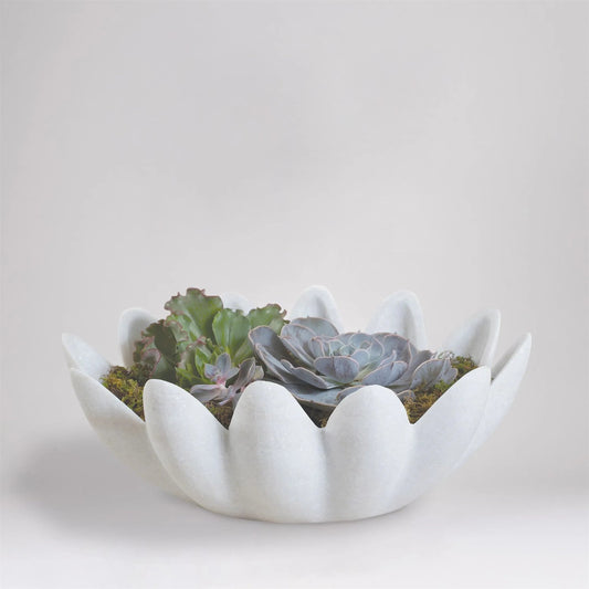 Gingerleaf Bowl by Global Views. Made from marble in a coastal style.