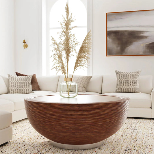 Harding Drum Coffee Table by Butler Specialty Company in brown. Made from gmelina solids, veneer arorog (skinned rattan), stainless steel in a unique style.