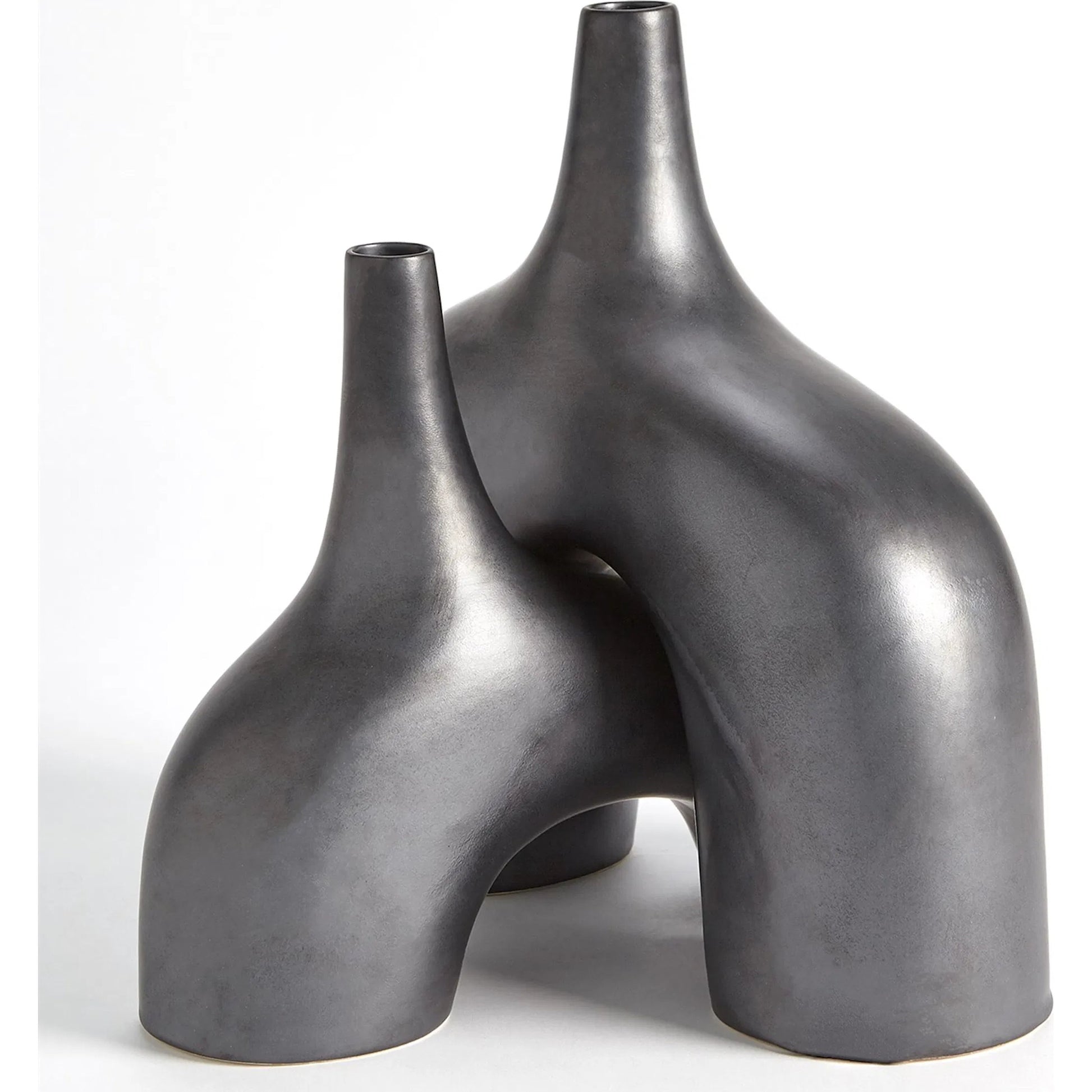 Stretch Vase by Global Views. Made from earthenware in a eclectic & global style.