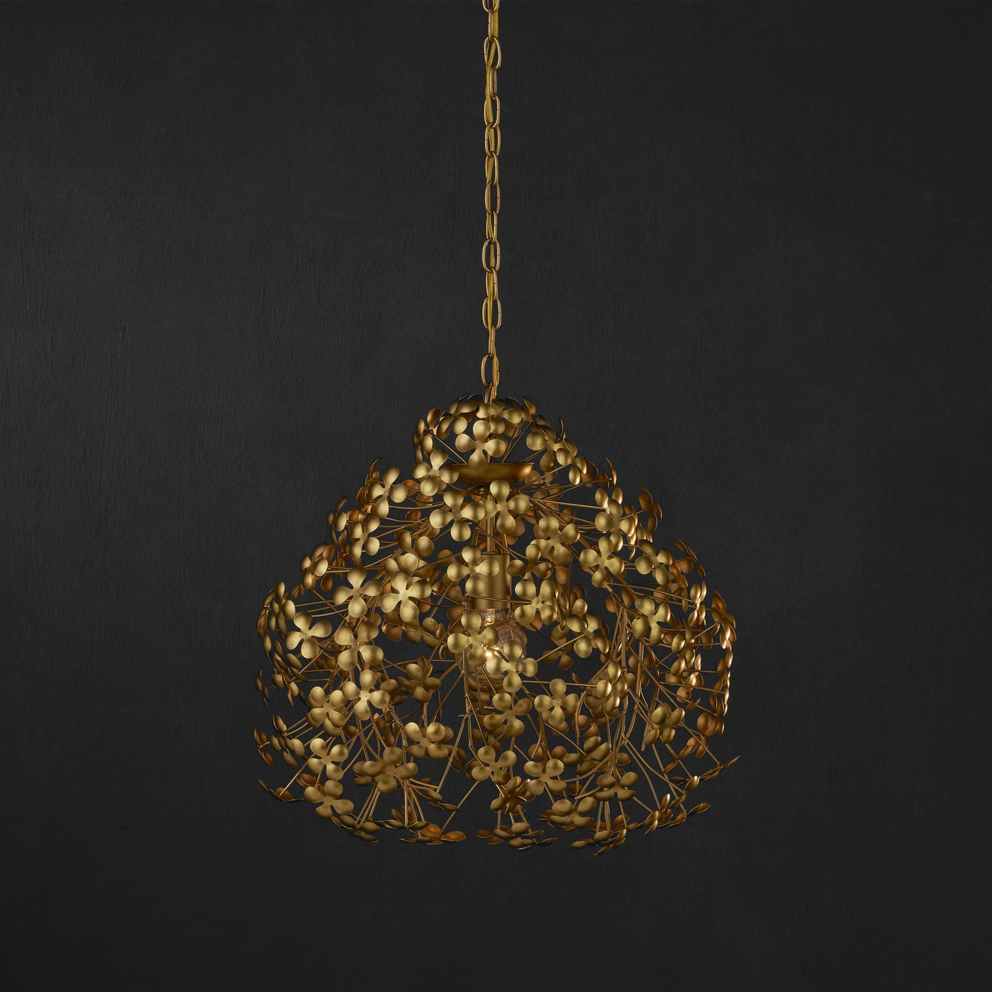 Cloverfield Pendant by Currey and Company in contemporary gold leaf. Made from wrought iron in a modern style.