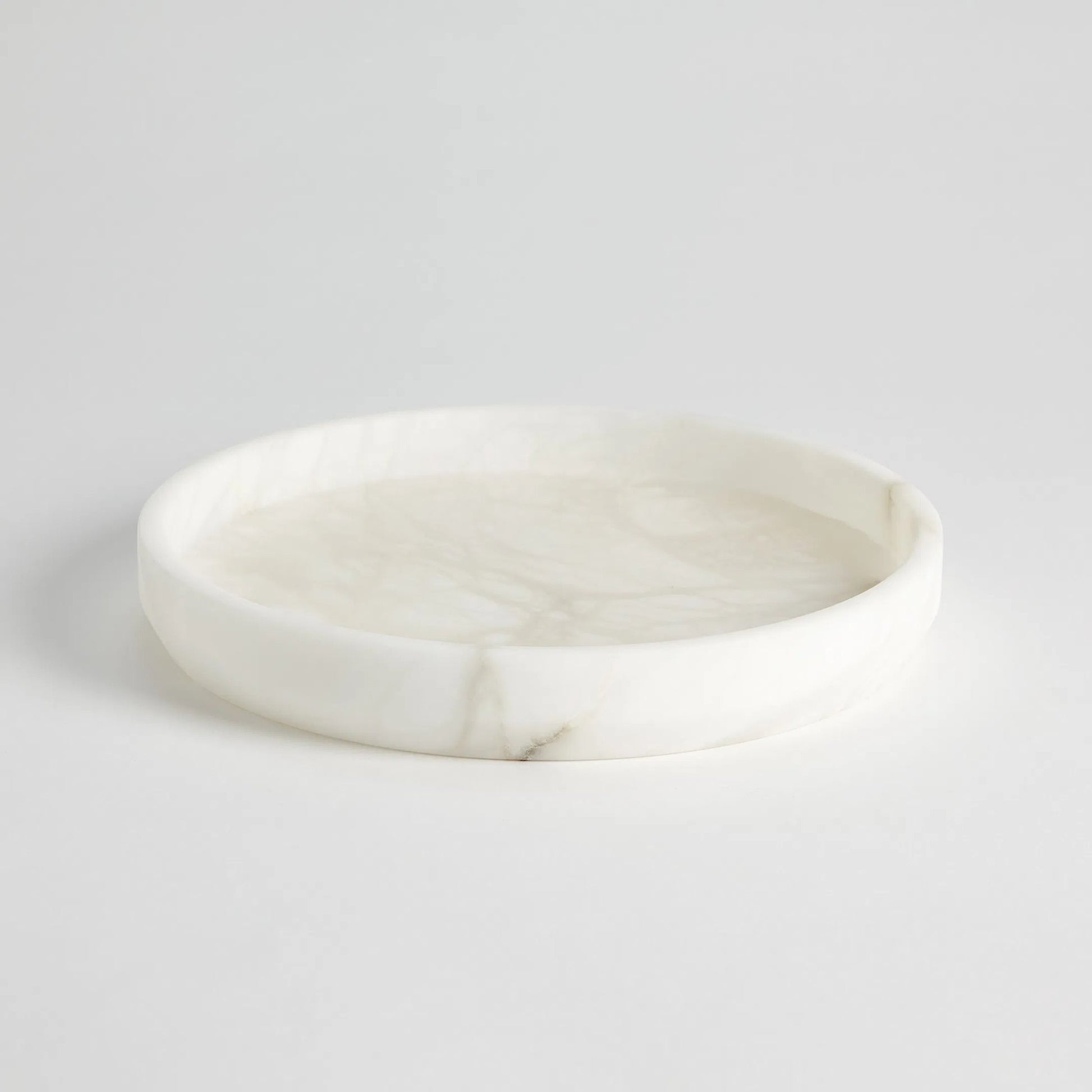 Alabaster Tapered Round Tray by Global Views in white. Made from alabaster in a modern style.