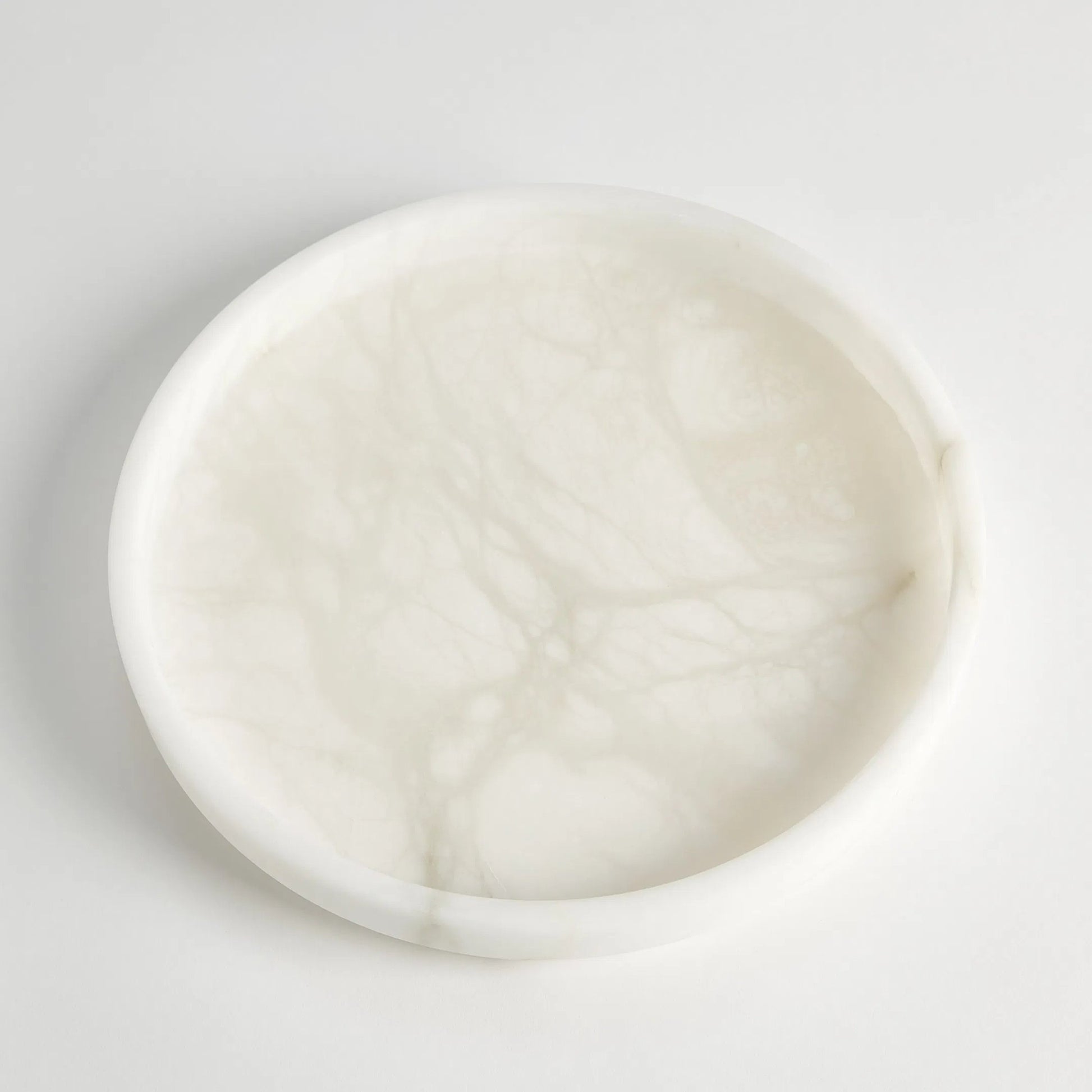 Alabaster Tapered Round Tray by Global Views in white. Made from alabaster in a modern style.