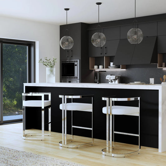 Clarence Barstool by Butler Specialty Company in white. Made from stainless steel, plyboard, foam, faux leather in a unique style.