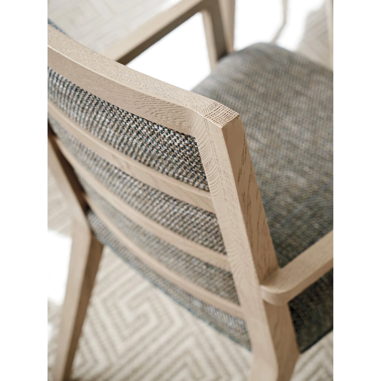 003 SI-2136890 | Closeup | Nicholas Upholstered Arm Chair by Tommy Bahama Home in sand drift. Made from unique in a modern style.