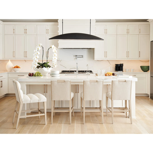 Greer Channeled Upholstered Counter Stool by Tommy Bahama Home in biscayne and sand drift. Made from unique in a modern style.