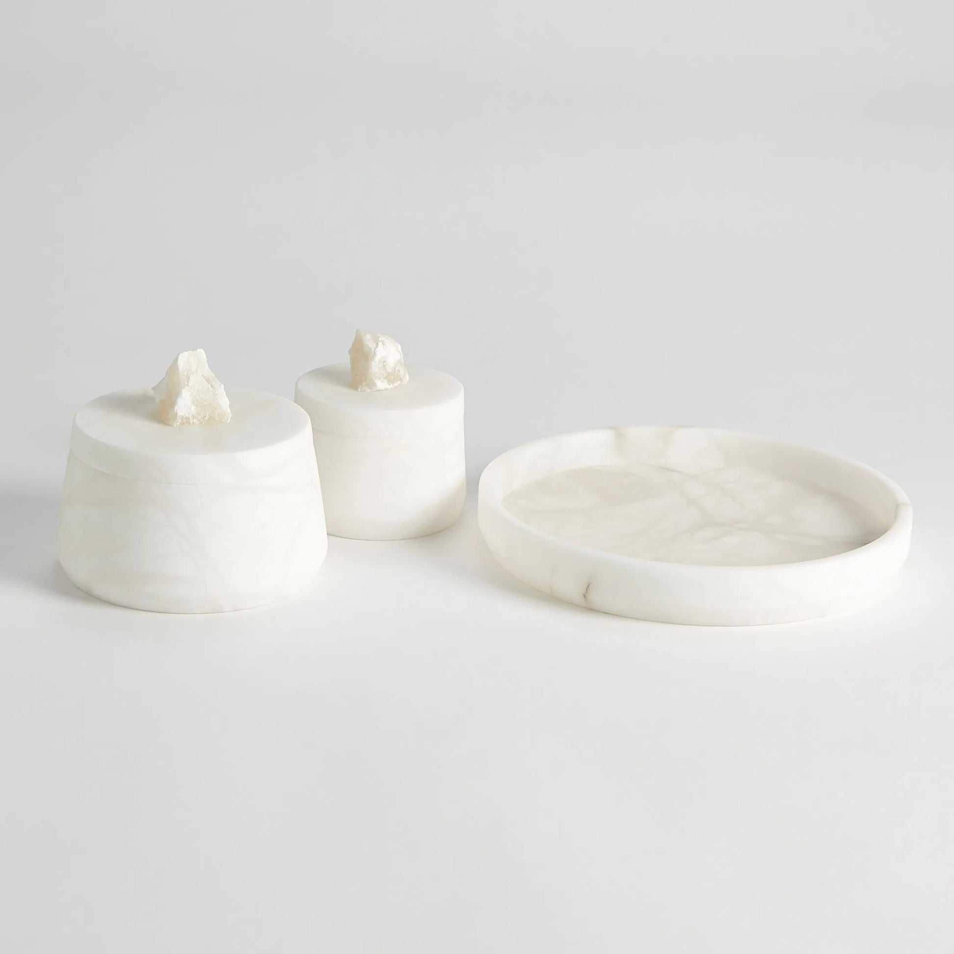 Alabaster Tapered Round Tray by Global Views in white. Made from alabaster in a modern style.