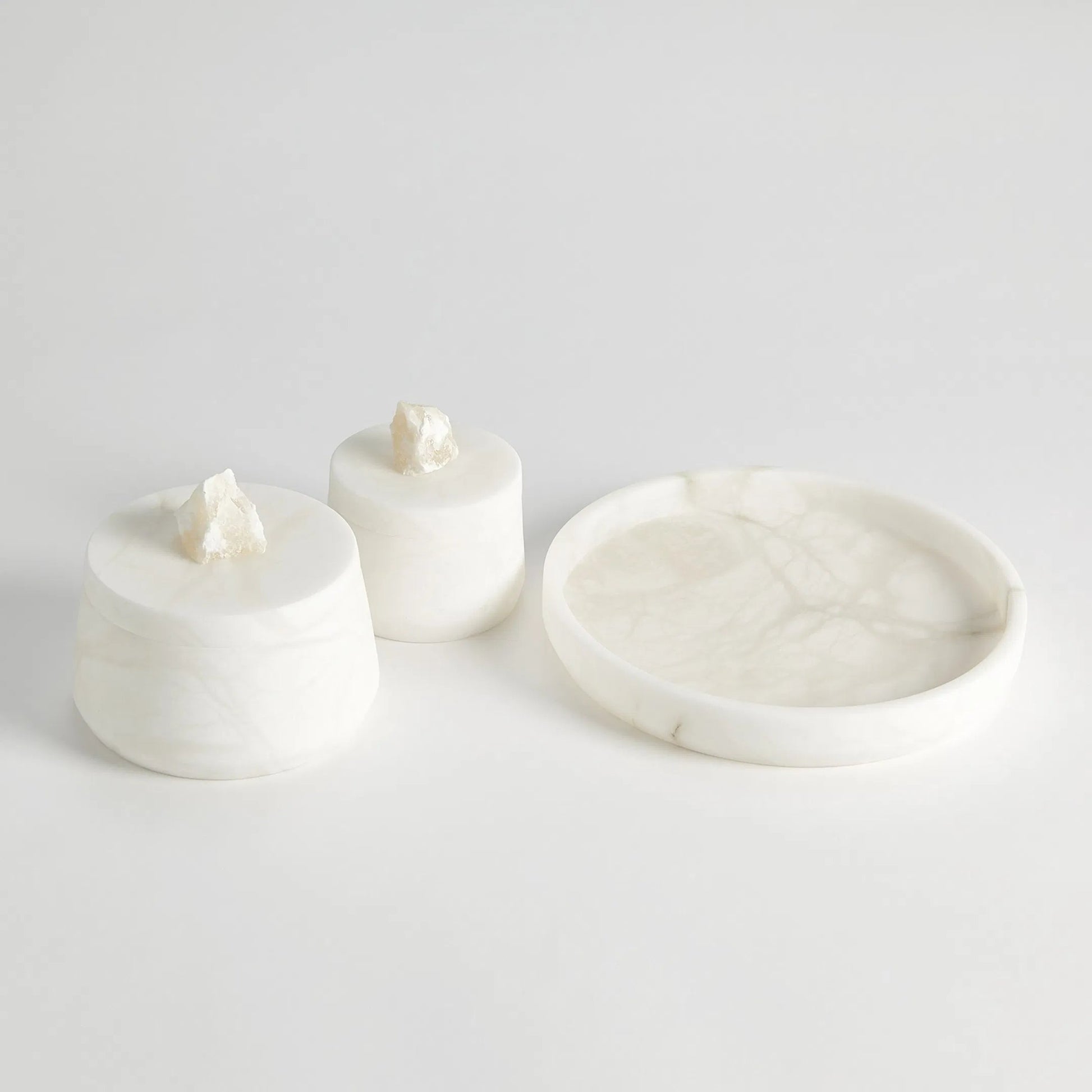 Alabaster Tapered Round Tray by Global Views in white. Made from alabaster in a modern style.