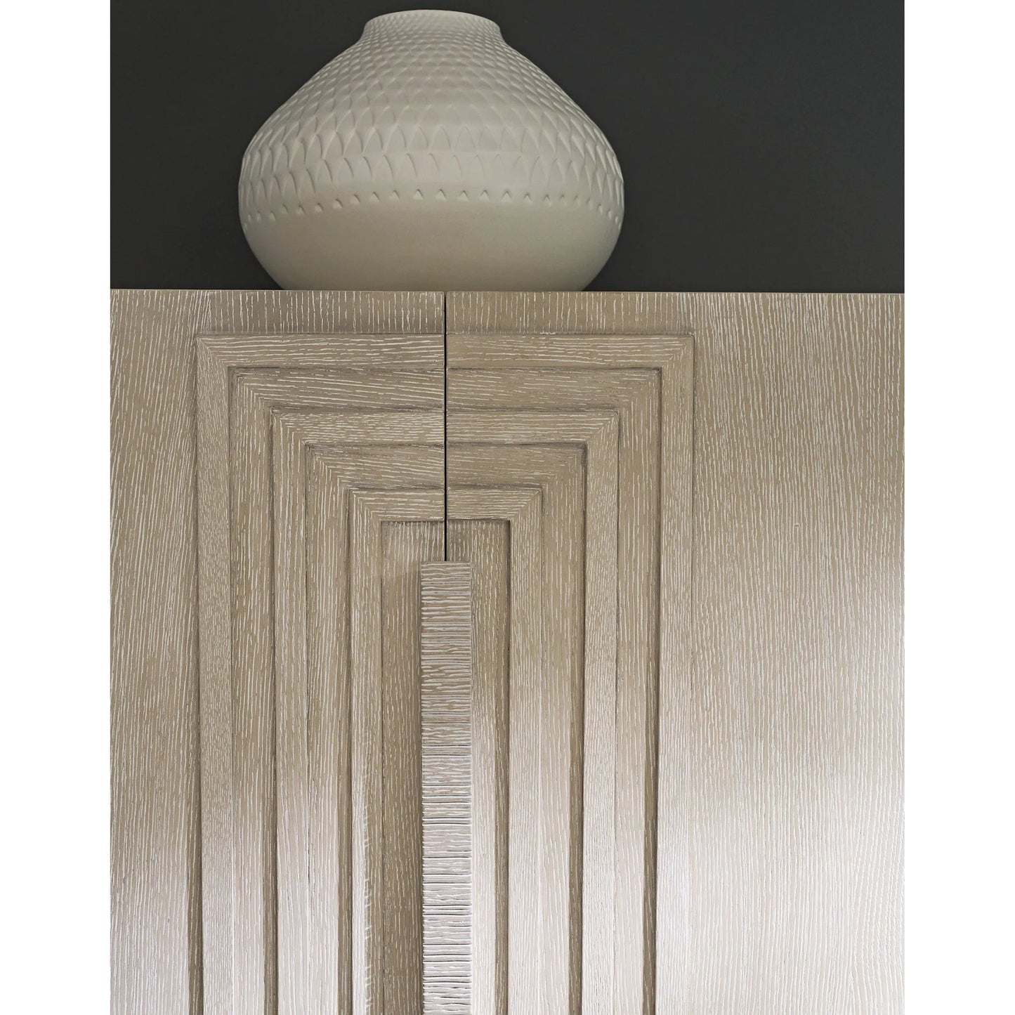 008 SI-2626535 | Closeup | Tamara Tall Chest by Tommy Bahama Home. Made from wood in a unique style.