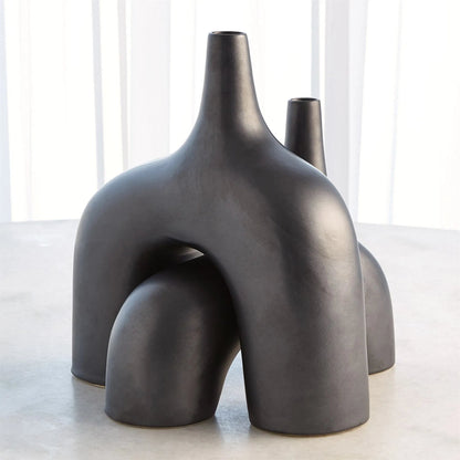 Stretch Vase by Global Views. Made from earthenware in a eclectic & global style.