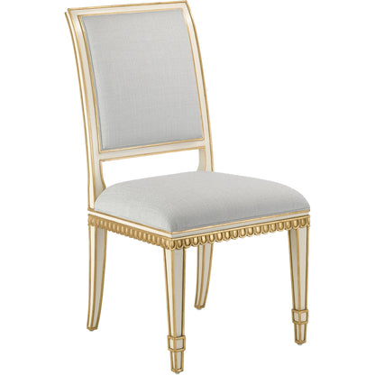 Ines Chair by Currey and Company in mixology moonstone and ivory, antique gold. Made from mahogany in a transitional style.