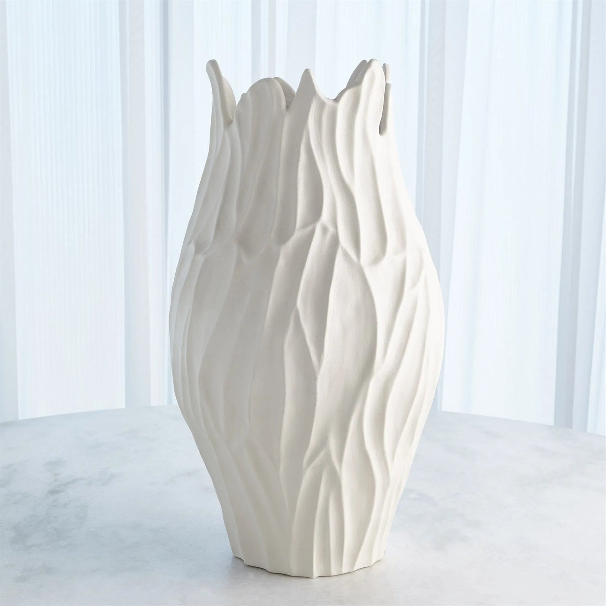 Bloom Round Vase by Global Views in matte white. Made from unique in a modern style.