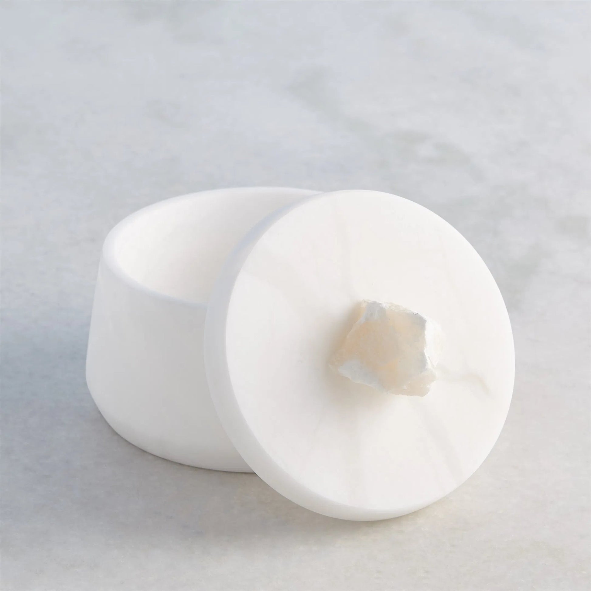 Alabaster Tapered Round Box with Rock Finial by Global Views in white. Made from alabaster in a modern style.