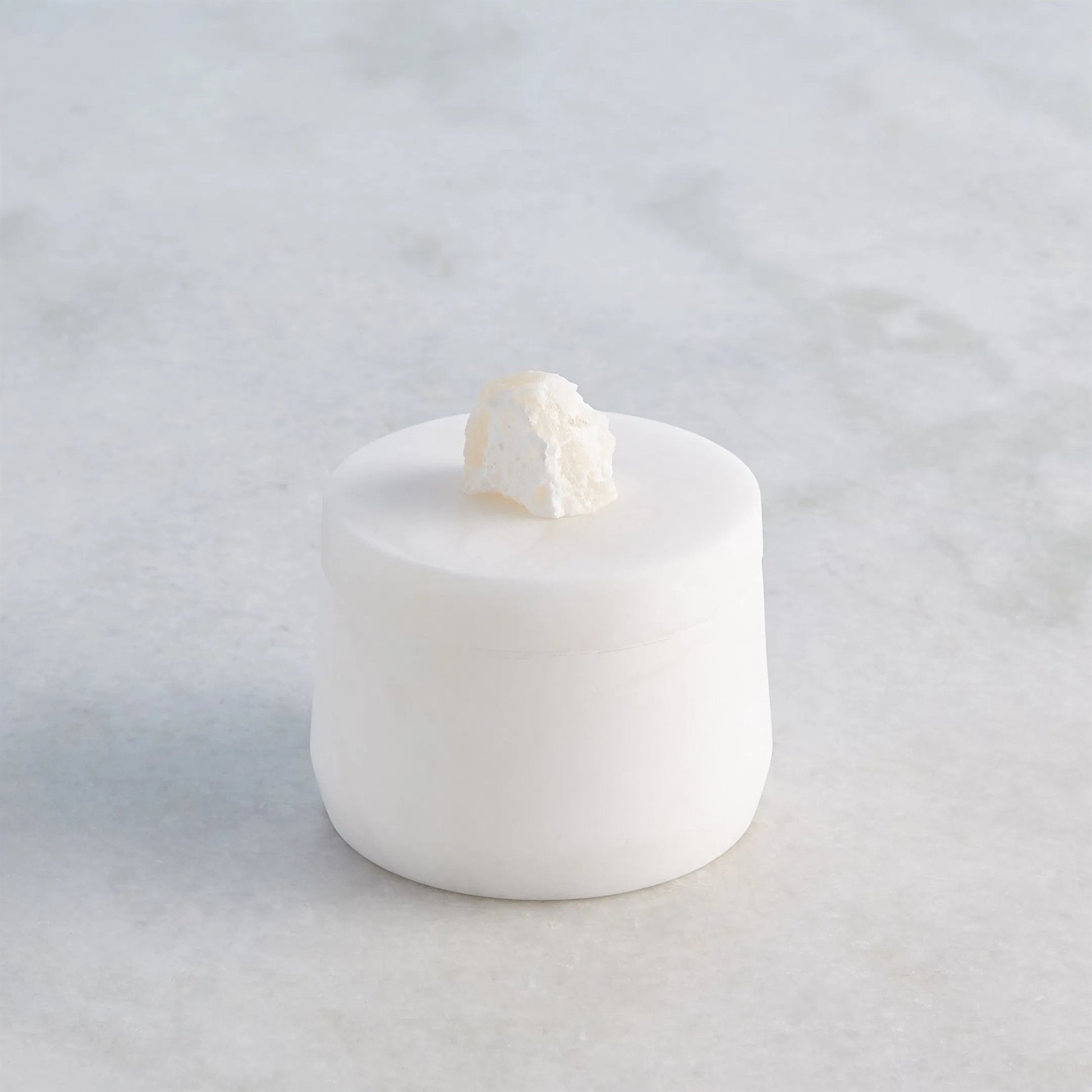 Alabaster Tapered Round Box with Rock Finial by Global Views in white. Made from alabaster in a modern style.