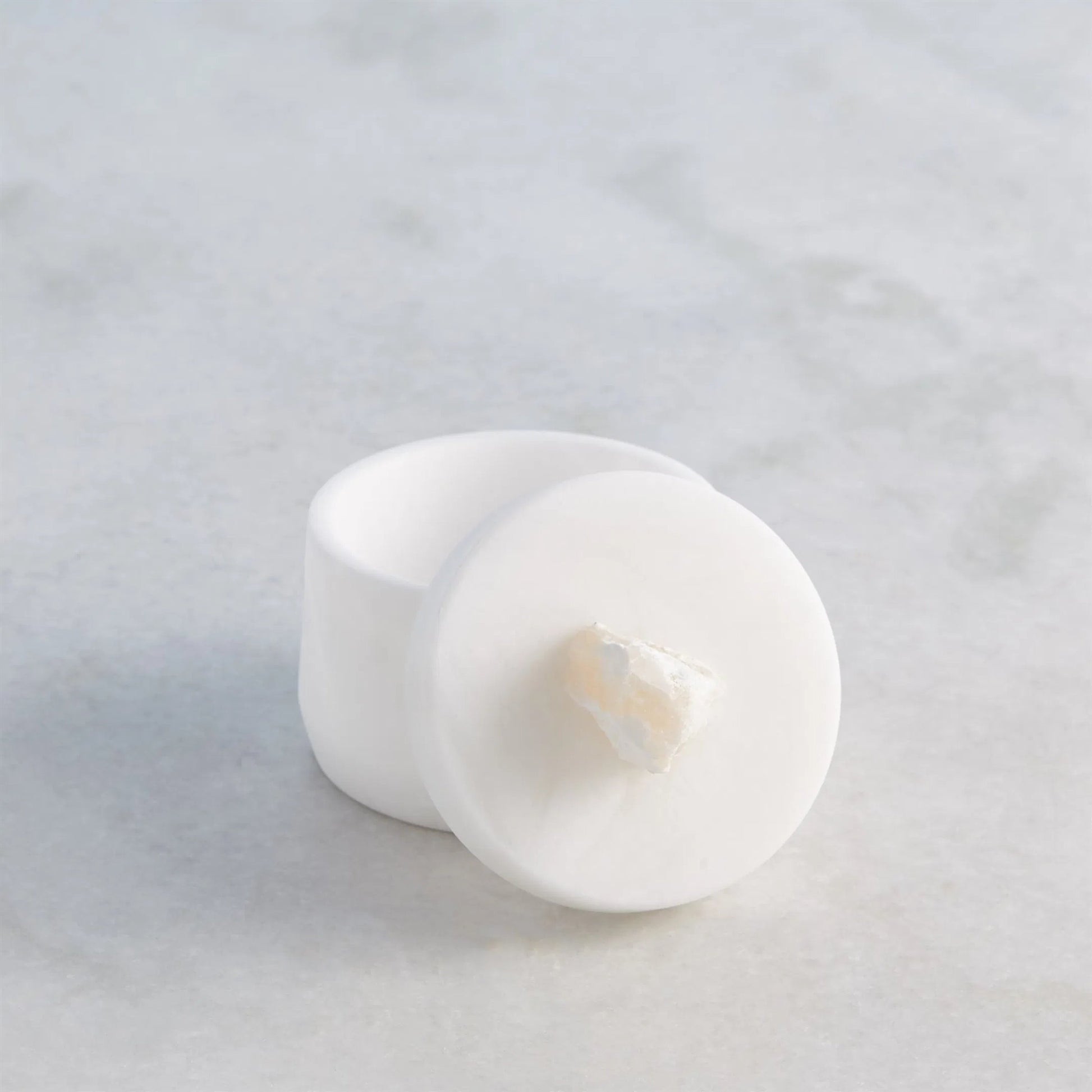 Alabaster Tapered Round Box with Rock Finial by Global Views in white. Made from alabaster in a modern style.