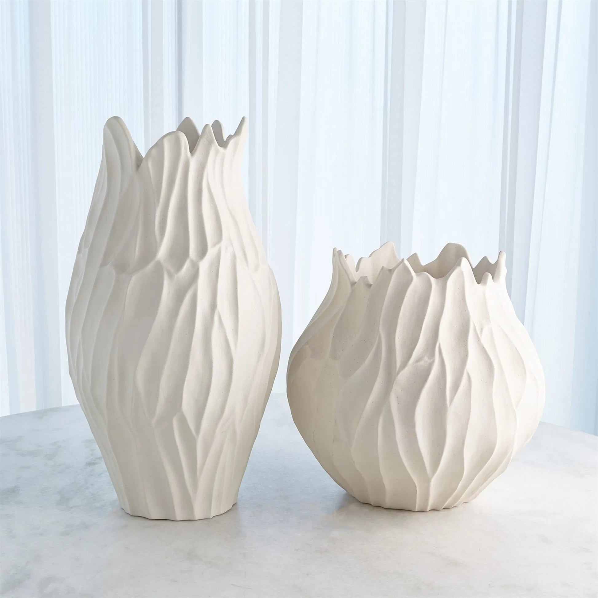 Bloom Round Vase by Global Views in matte white. Made from unique in a modern style.