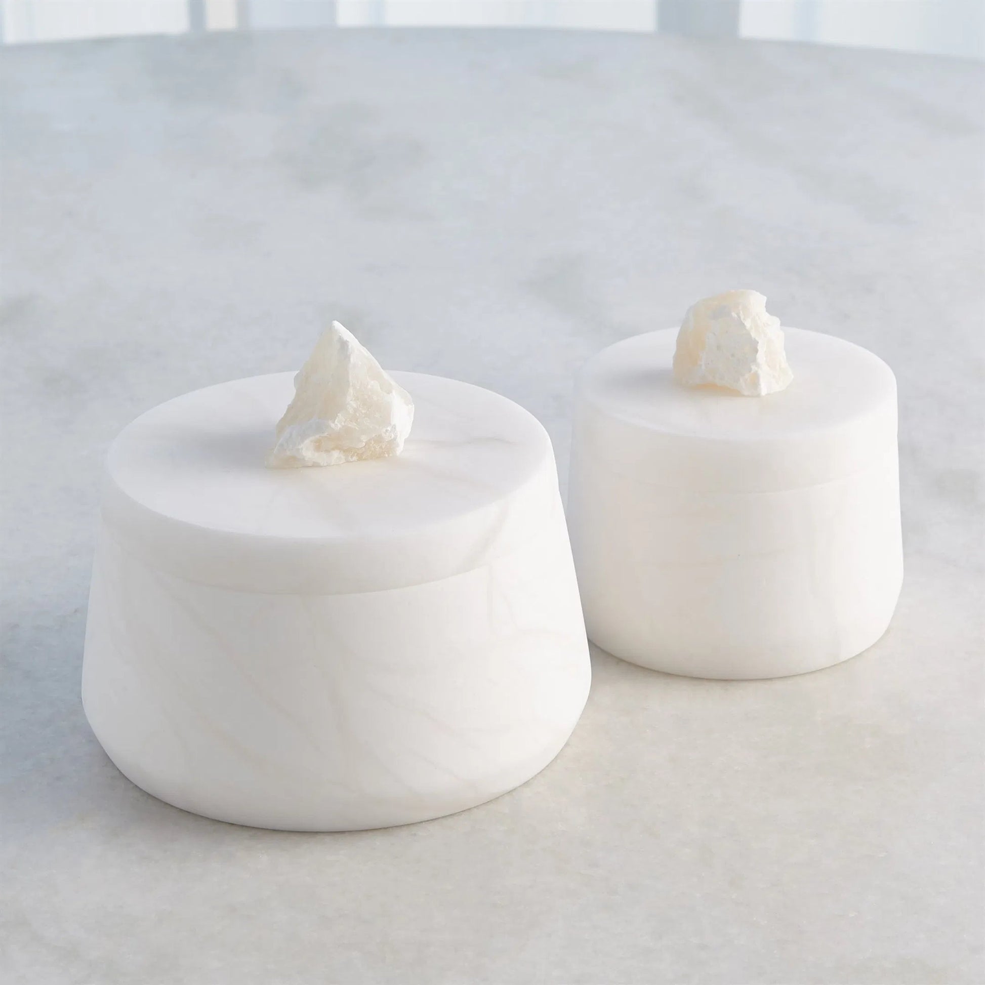 Alabaster Tapered Round Box with Rock Finial by Global Views in white. Made from alabaster in a modern style.