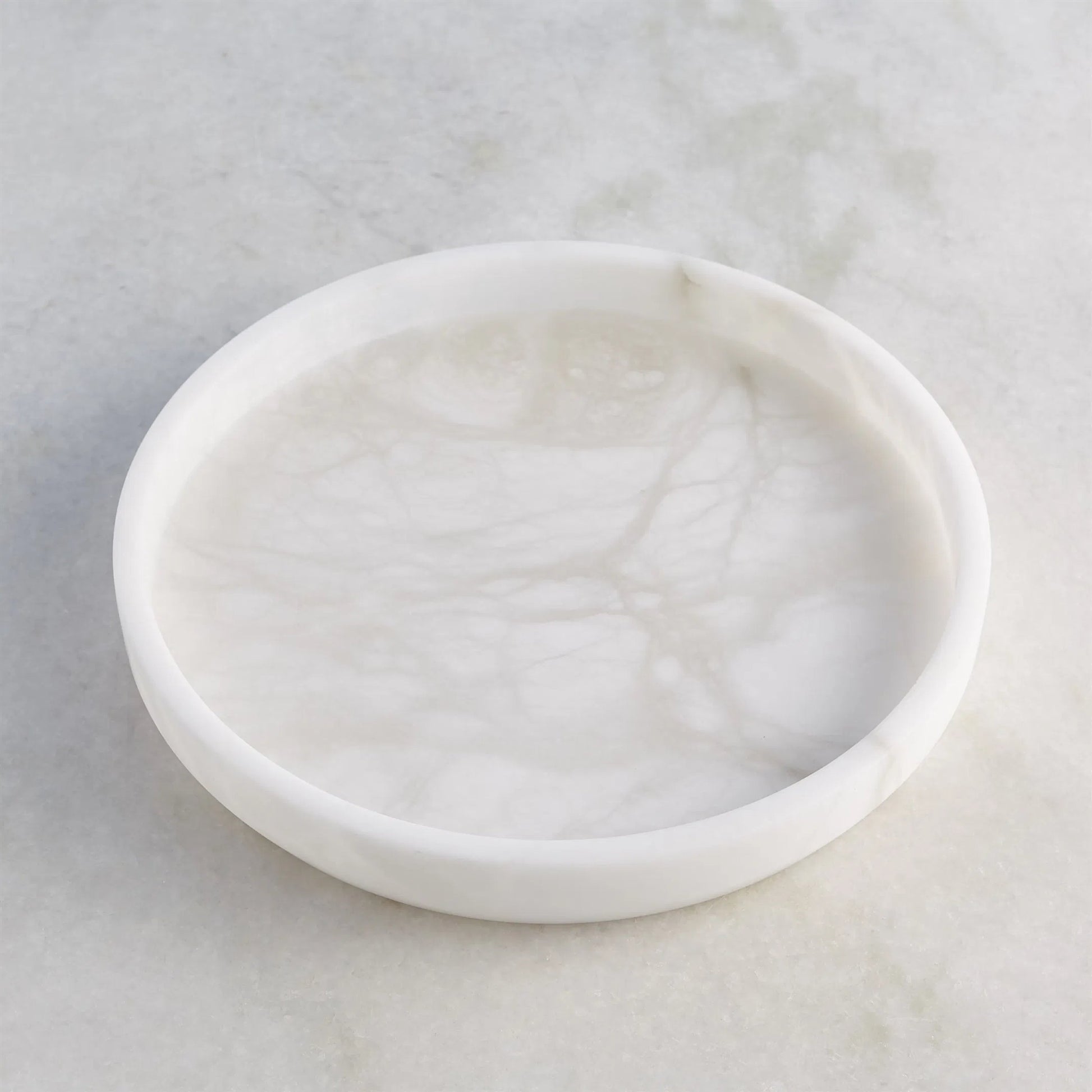 Alabaster Tapered Round Tray by Global Views in white. Made from alabaster in a modern style.