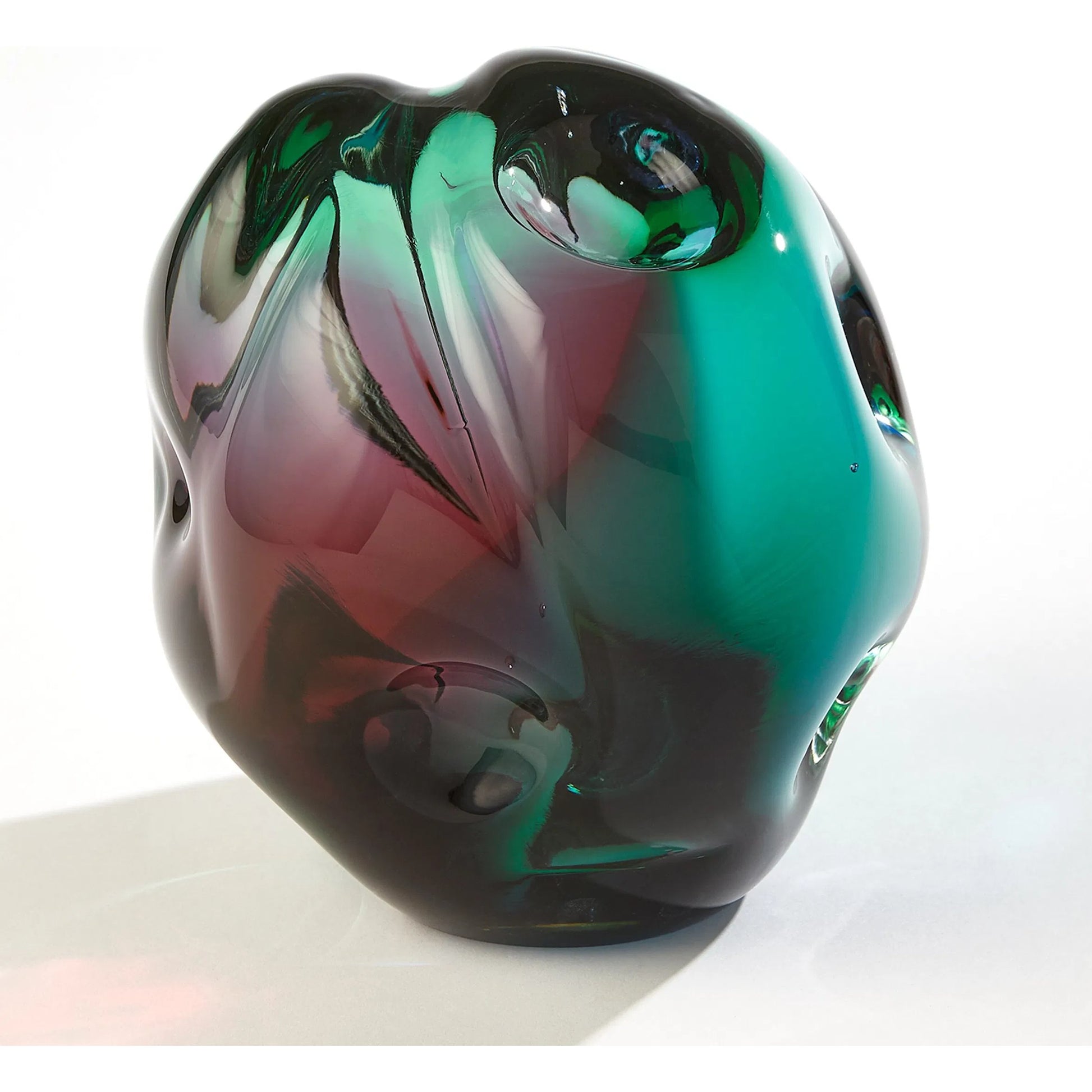 Dimpled Sphere by Global Views. Made from art glass in a eclectic & global style.