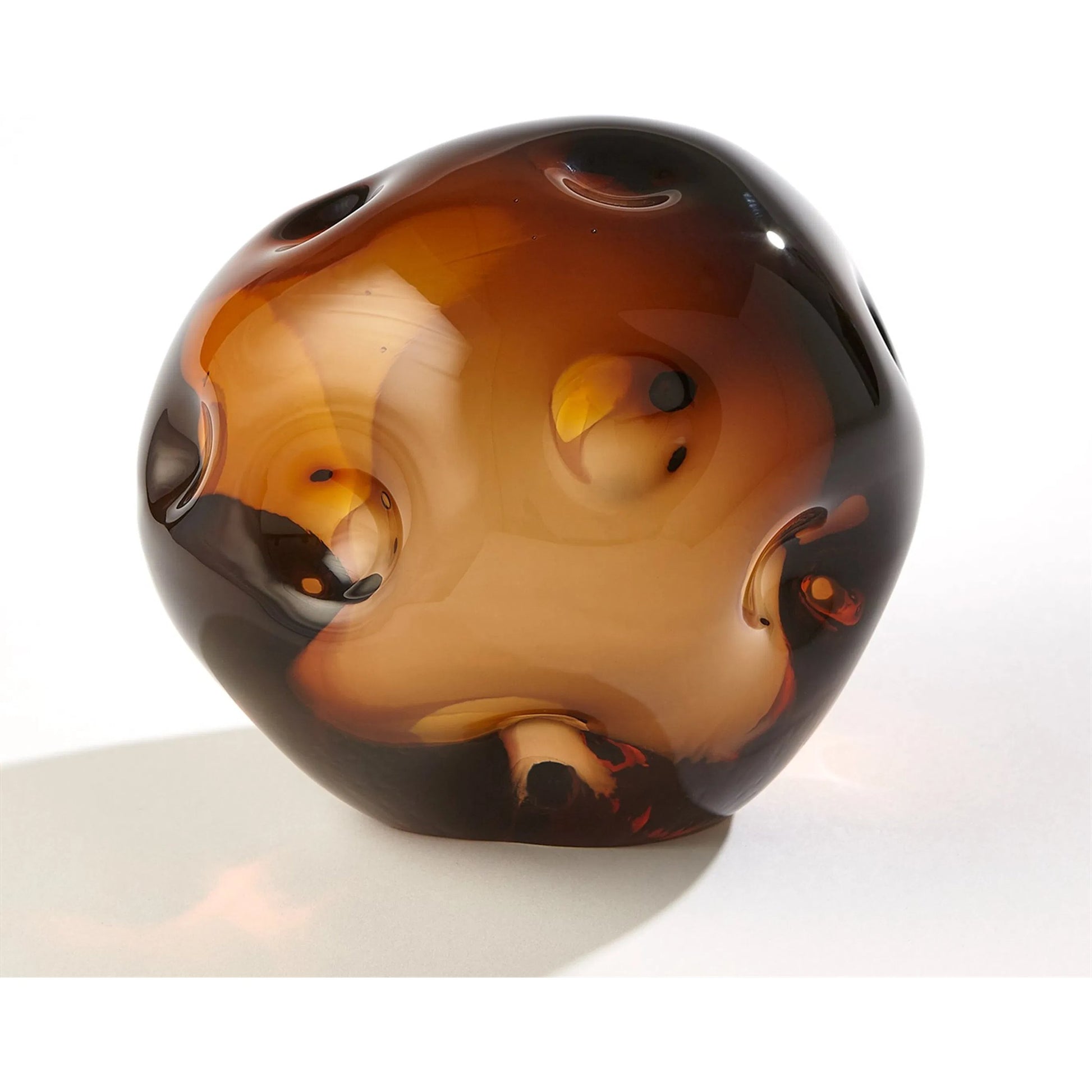 Dimpled Sphere by Global Views. Made from art glass in a eclectic & global style.