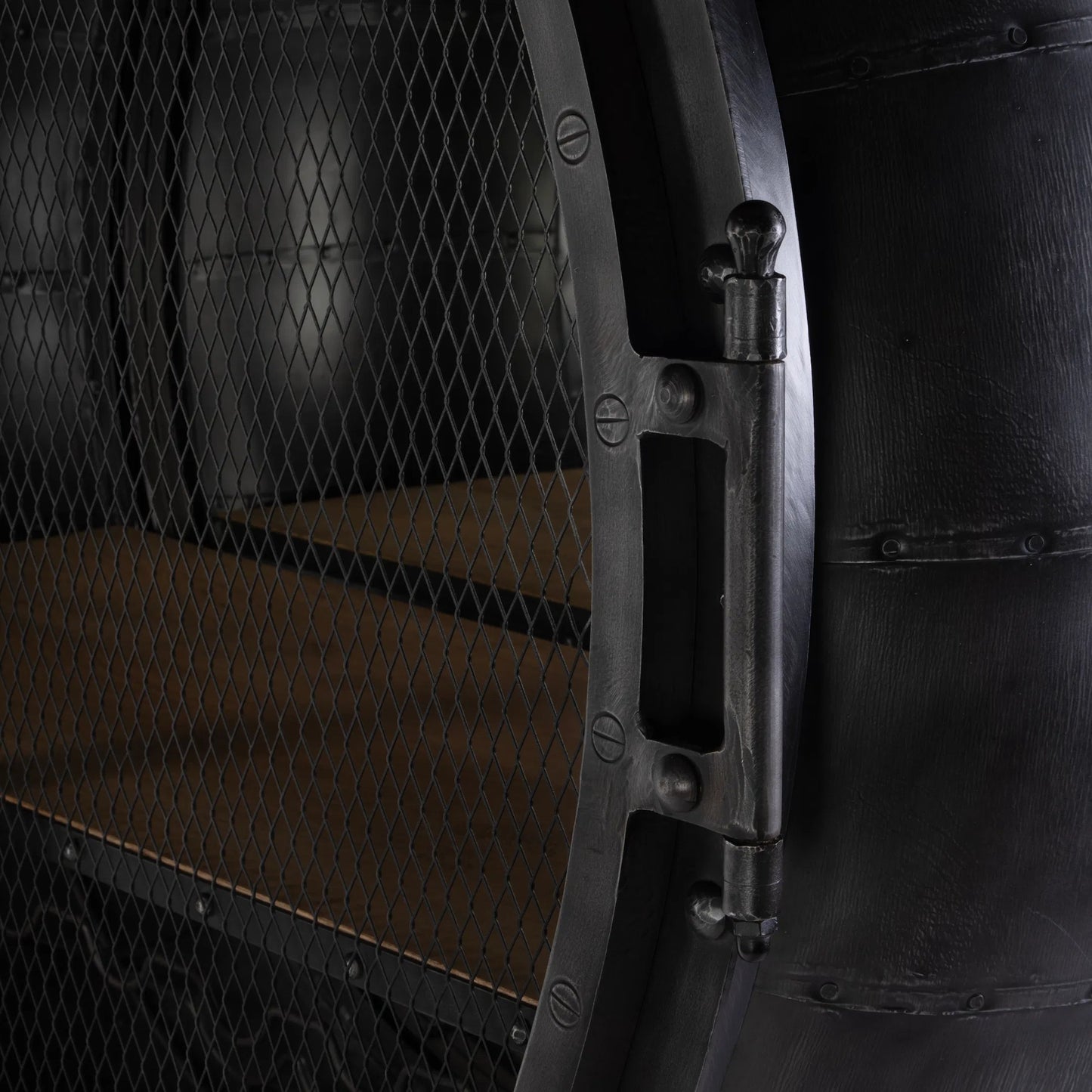 005 SI-2448207 | Closeup | Roanoke Bar Cabinet by Butler Specialty Company in black. Made from iron, mango wood, mirror in a traditional style.