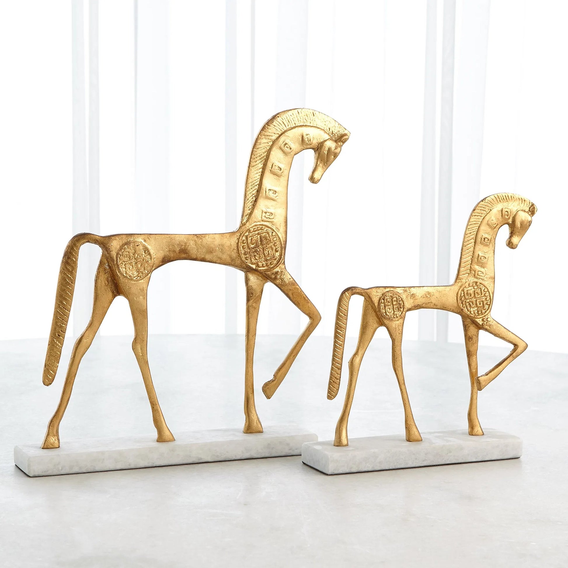 Roman Horse by Global Views in gold. Made from cast steel 50%, white marble 50% in a unique style.