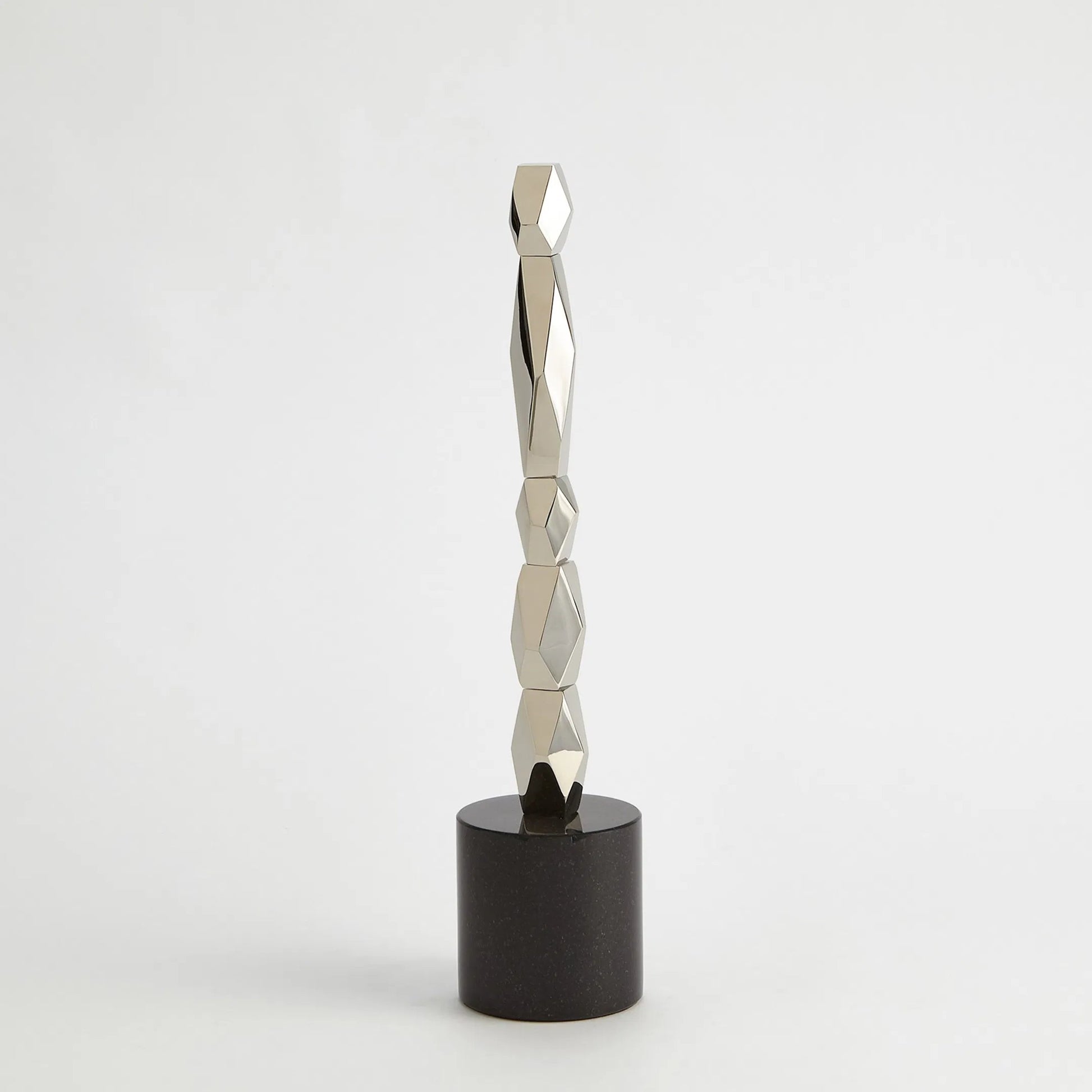 Facet Block Sculpture by Global Views. Made from unique in a unique style.