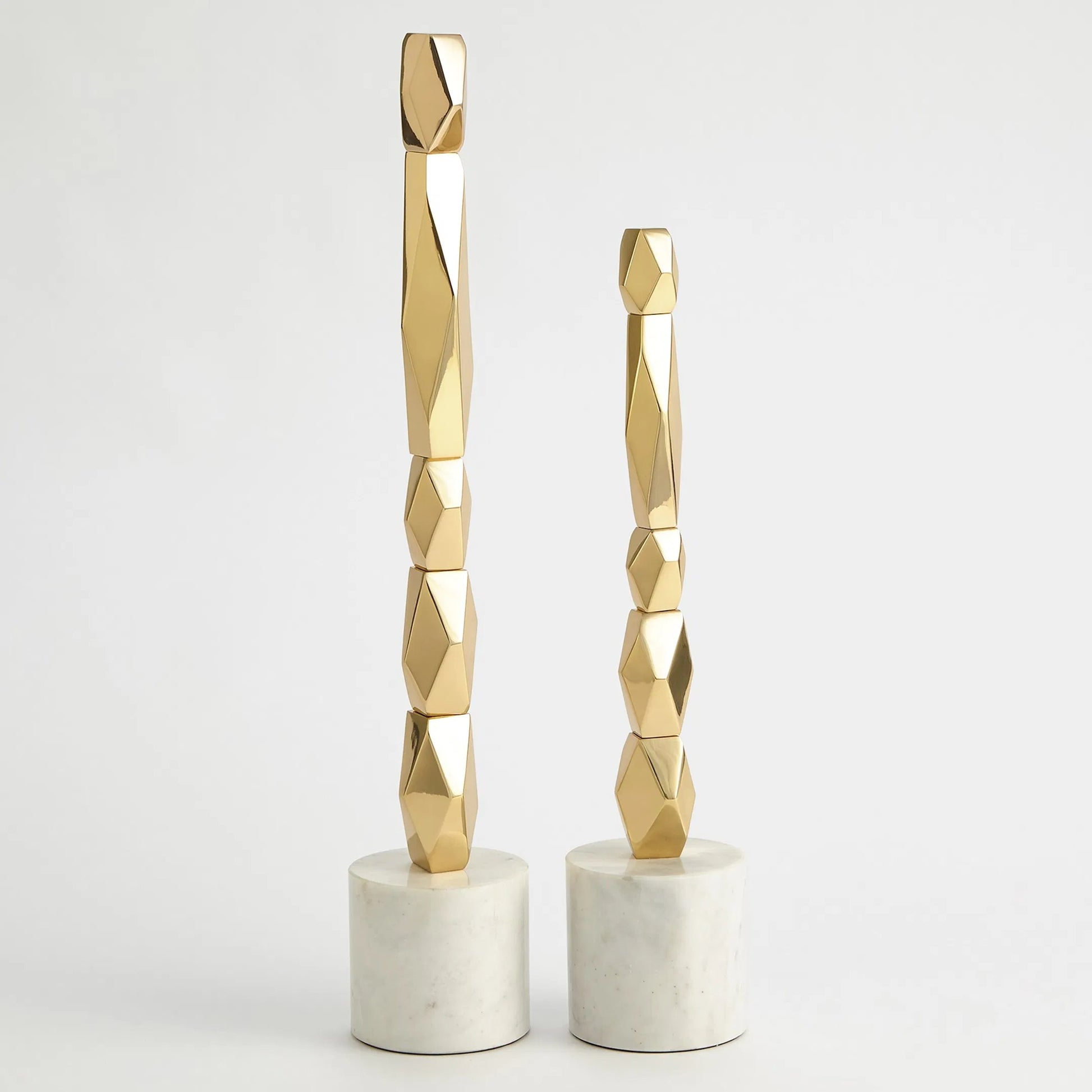 Facet Block Sculpture by Global Views. Made from unique in a unique style.
