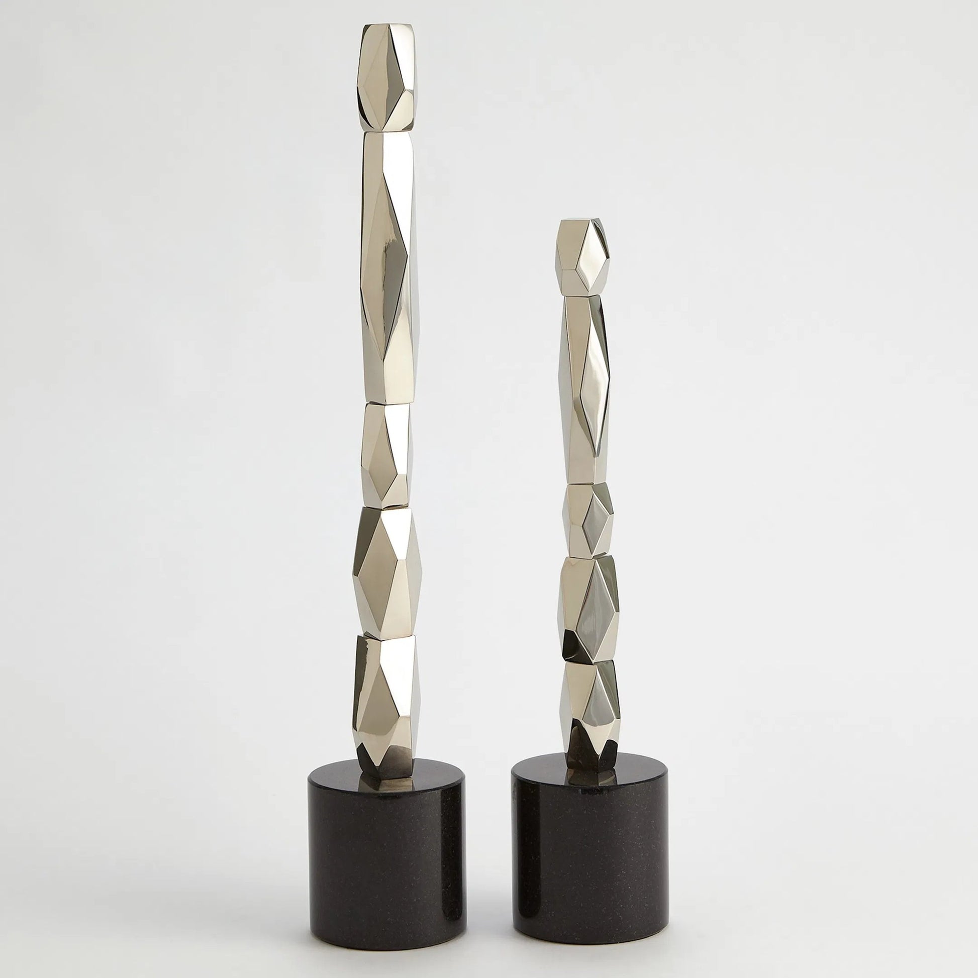 Facet Block Sculpture by Global Views. Made from unique in a unique style.