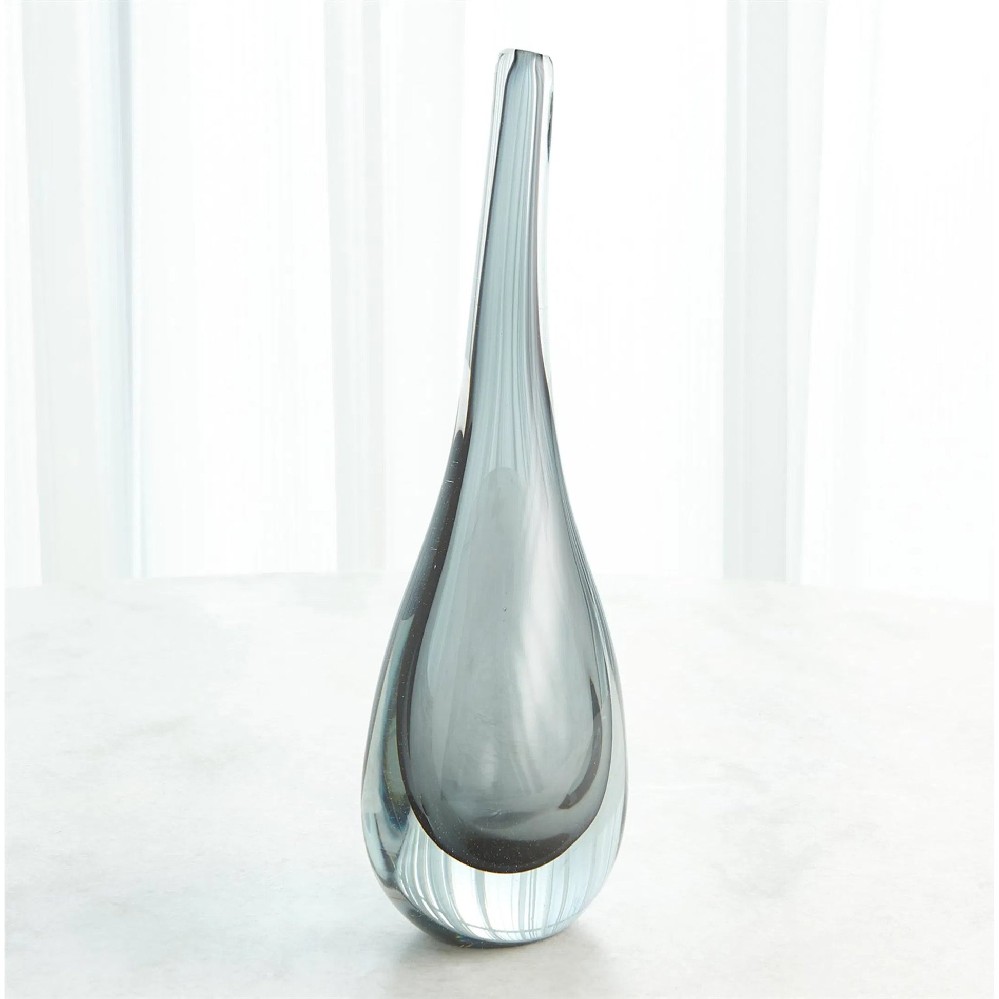 Stretched Neck Vase by Global Views. Made from art glass in a modern style.