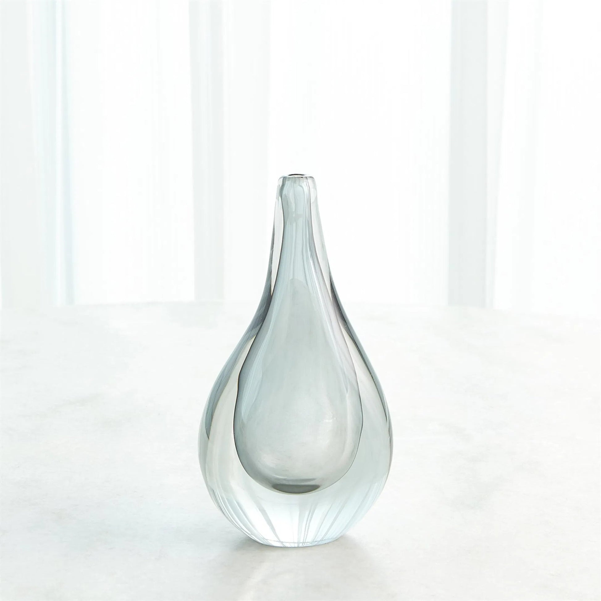 Stretched Neck Vase by Global Views. Made from art glass in a modern style.