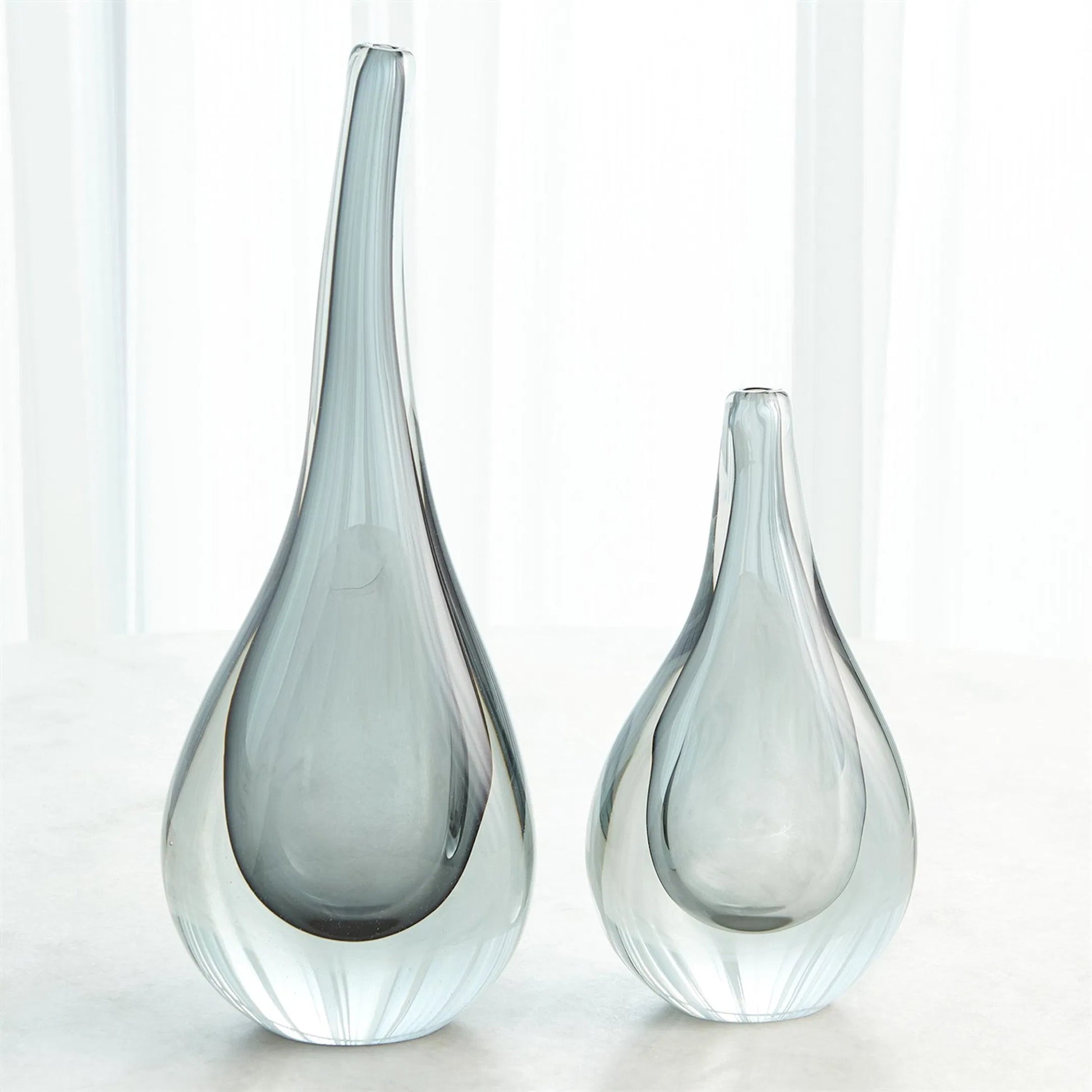 Stretched Neck Vase by Global Views. Made from art glass in a modern style.