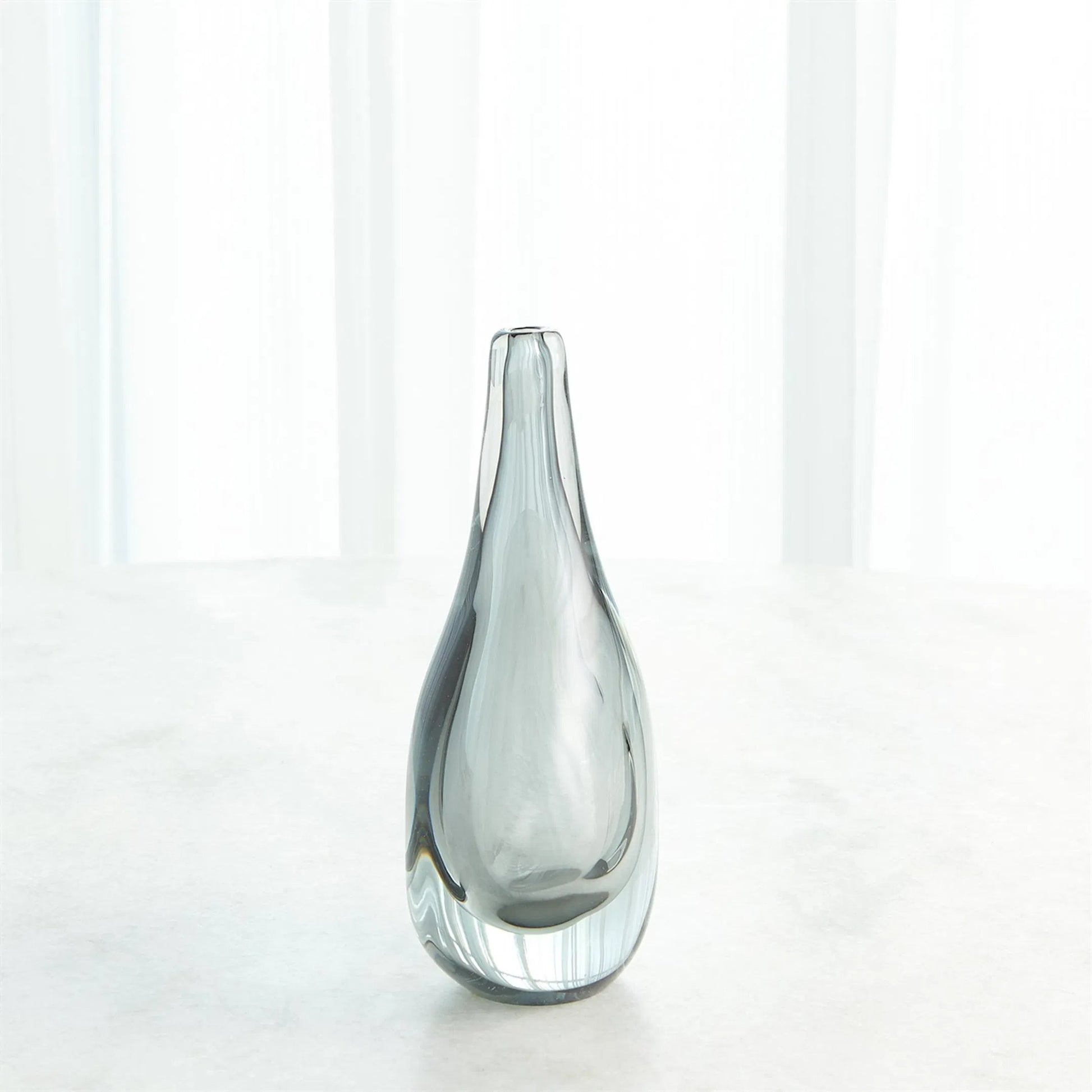 Stretched Neck Vase by Global Views. Made from art glass in a modern style.