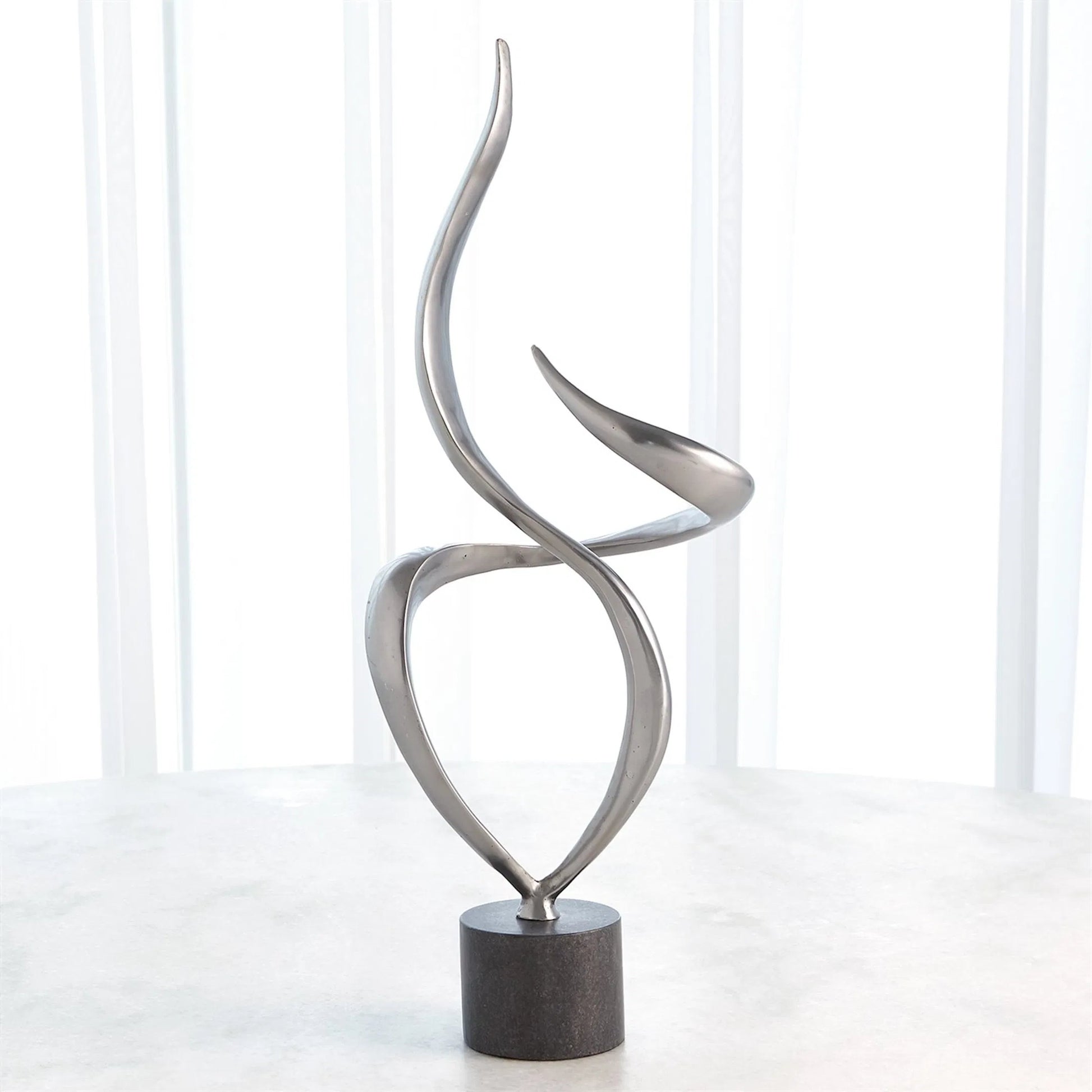Swirl Metal Sculpture by Global Views in brass and marble. Made from unique in a transitional style.
