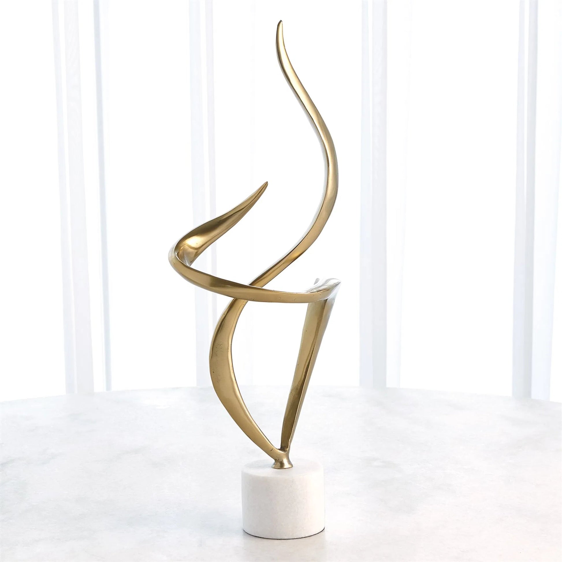 Swirl Metal Sculpture by Global Views in brass and marble. Made from unique in a transitional style.